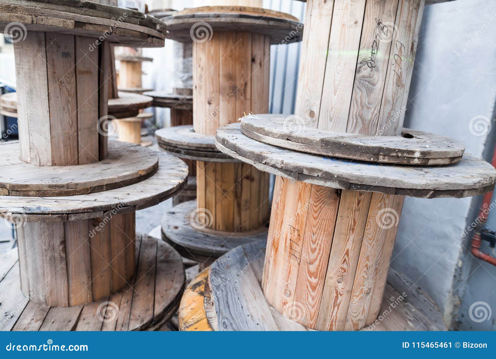 Big empty cable reels stock image. Image of table, wooden 115465461