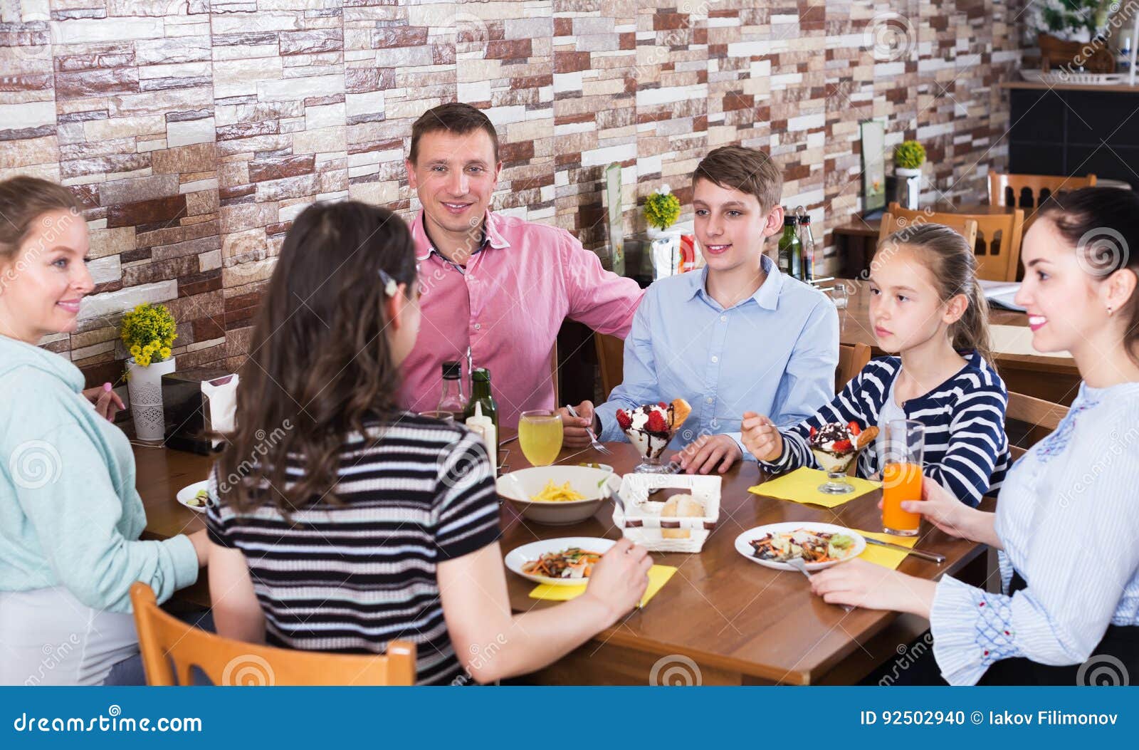 Big family in cafe stock photo. Image of cheerful, parenthood 92502940