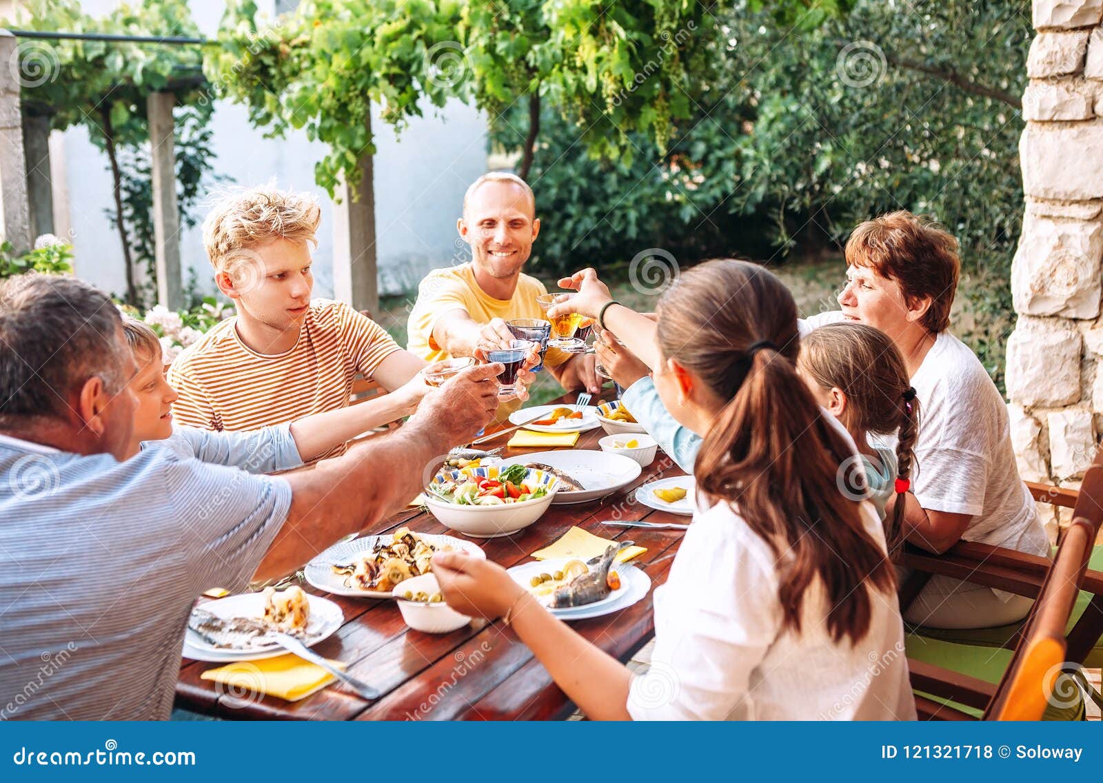 Big Family Have a Dinner on Garden Terrace Stock Photo - Image of