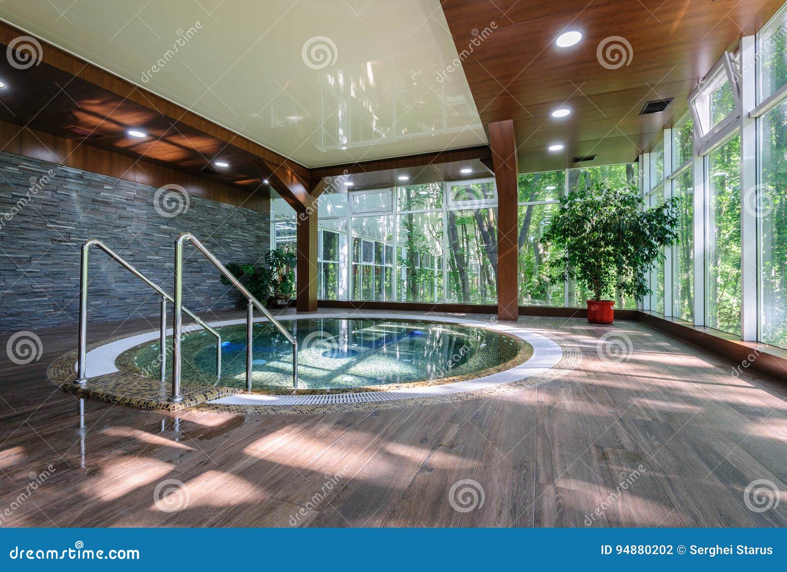 Modern bathroom with jacuzzi bath, copy space Stock Photo - Alamy