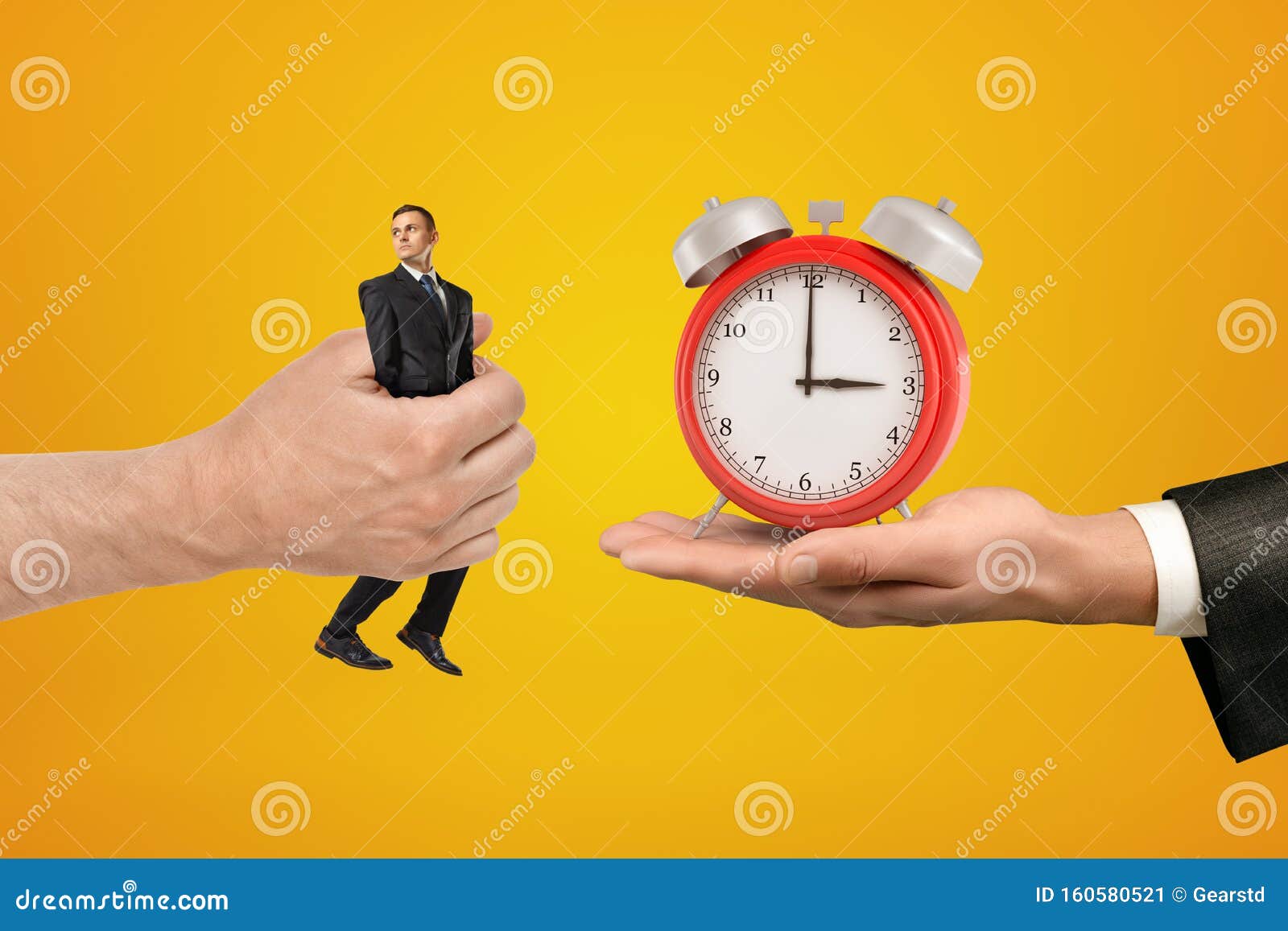 Businessman trying to stop time Stock Photo by ©kantver 69891211