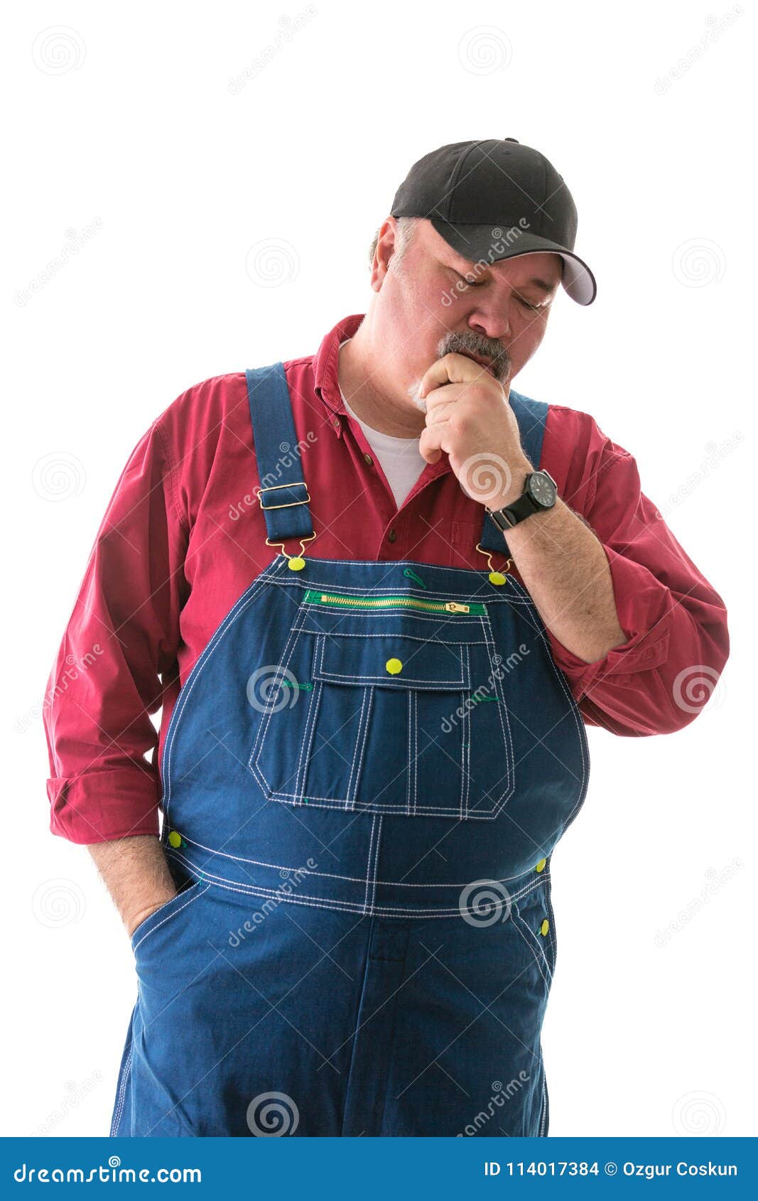 Big Man In Overalls And Cap Standing Thinking Stock Photo - Image ...