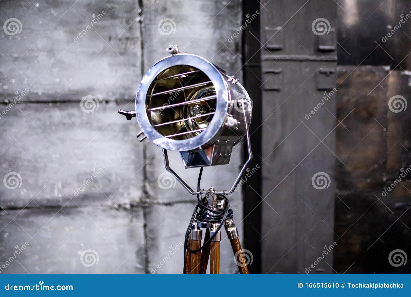 Big Metal Spotlight in the Studio. Vintage Spotlight Stock Photo Image of dark, electric