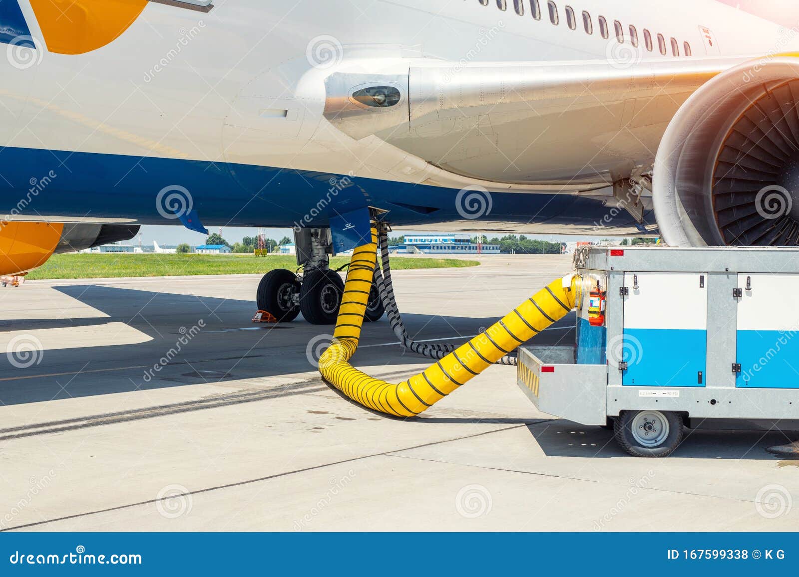Big Modern Commercial Plane Parked On Airport Runway And Connected To  Ground Supply Power Unit. Aircraft Maintenance Stock Photo - Image Of  Aviation, Electric: 167599338