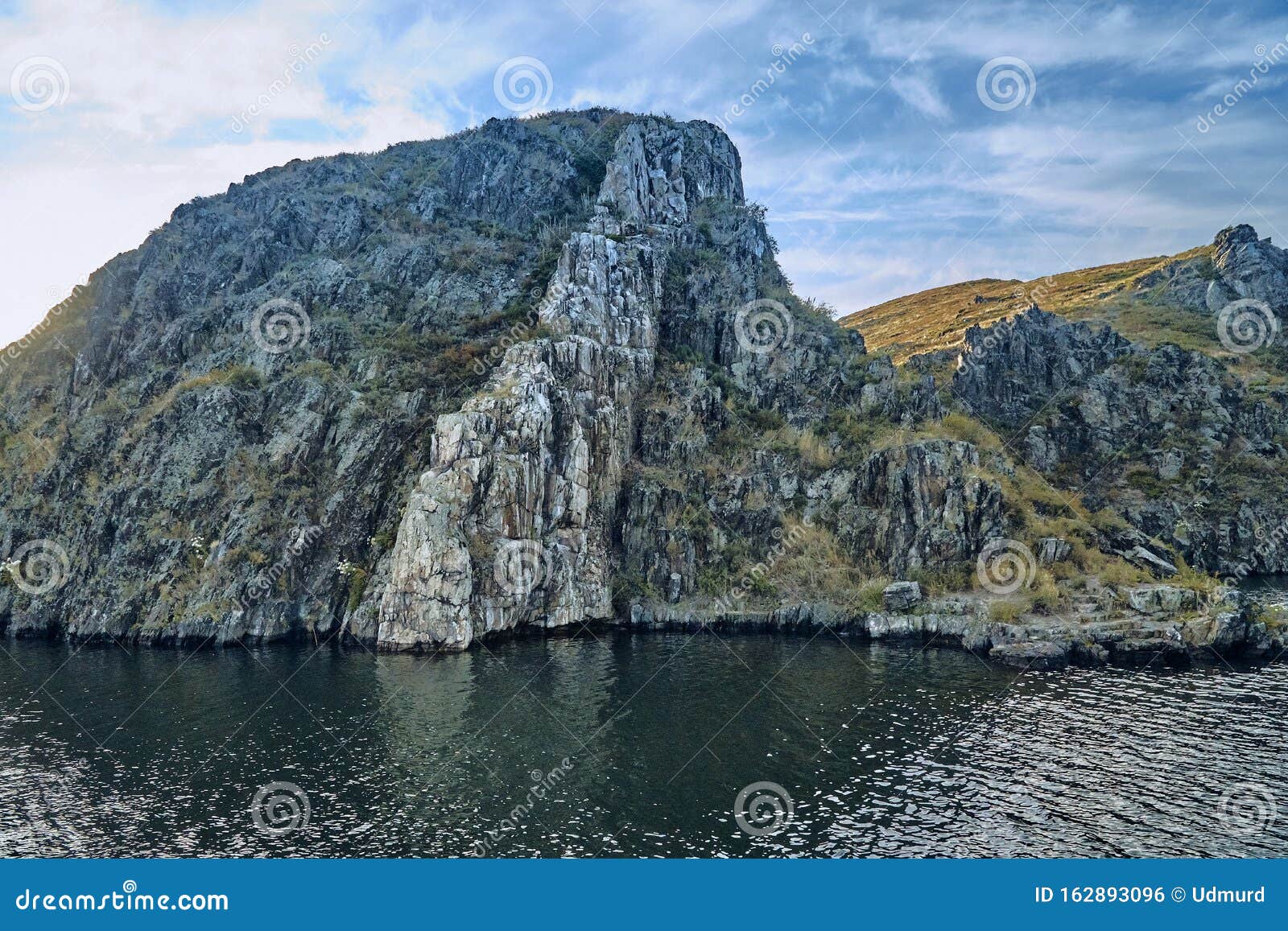 big old sheer cliffs - summer view to the bukhtarma artificial reservoir, formed by the dam of the bukhtarma hydroelectric station