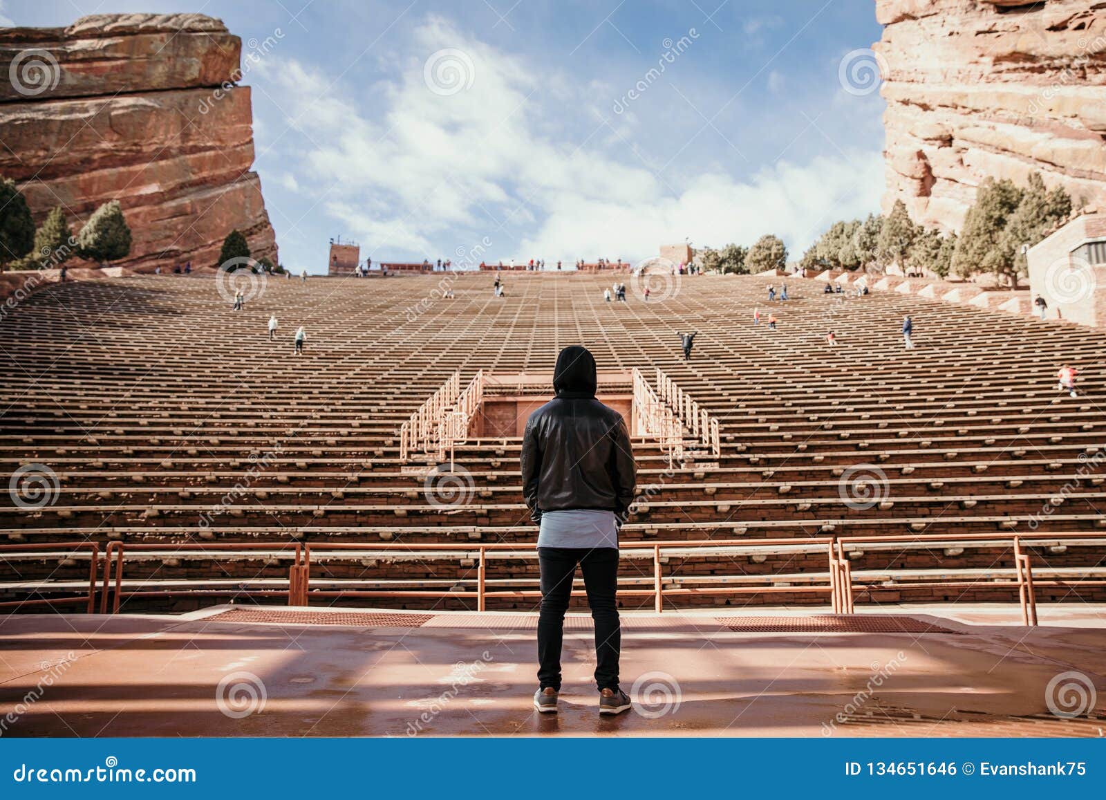 Symmetrical Portrait of Male Person Standing Front and Center on a