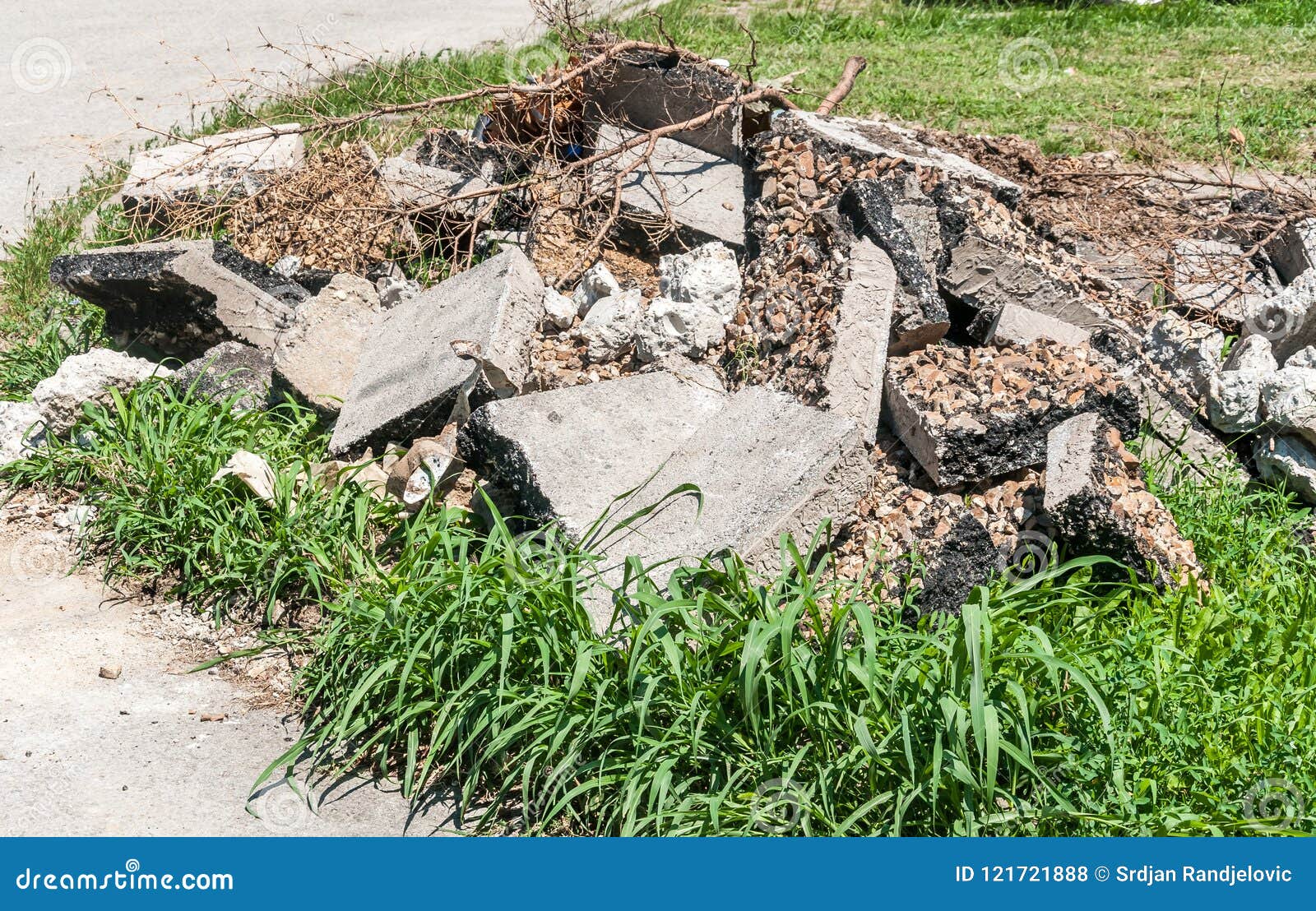 Big pile of old asphalt road debris damaged piling up on the ground after replacement with new