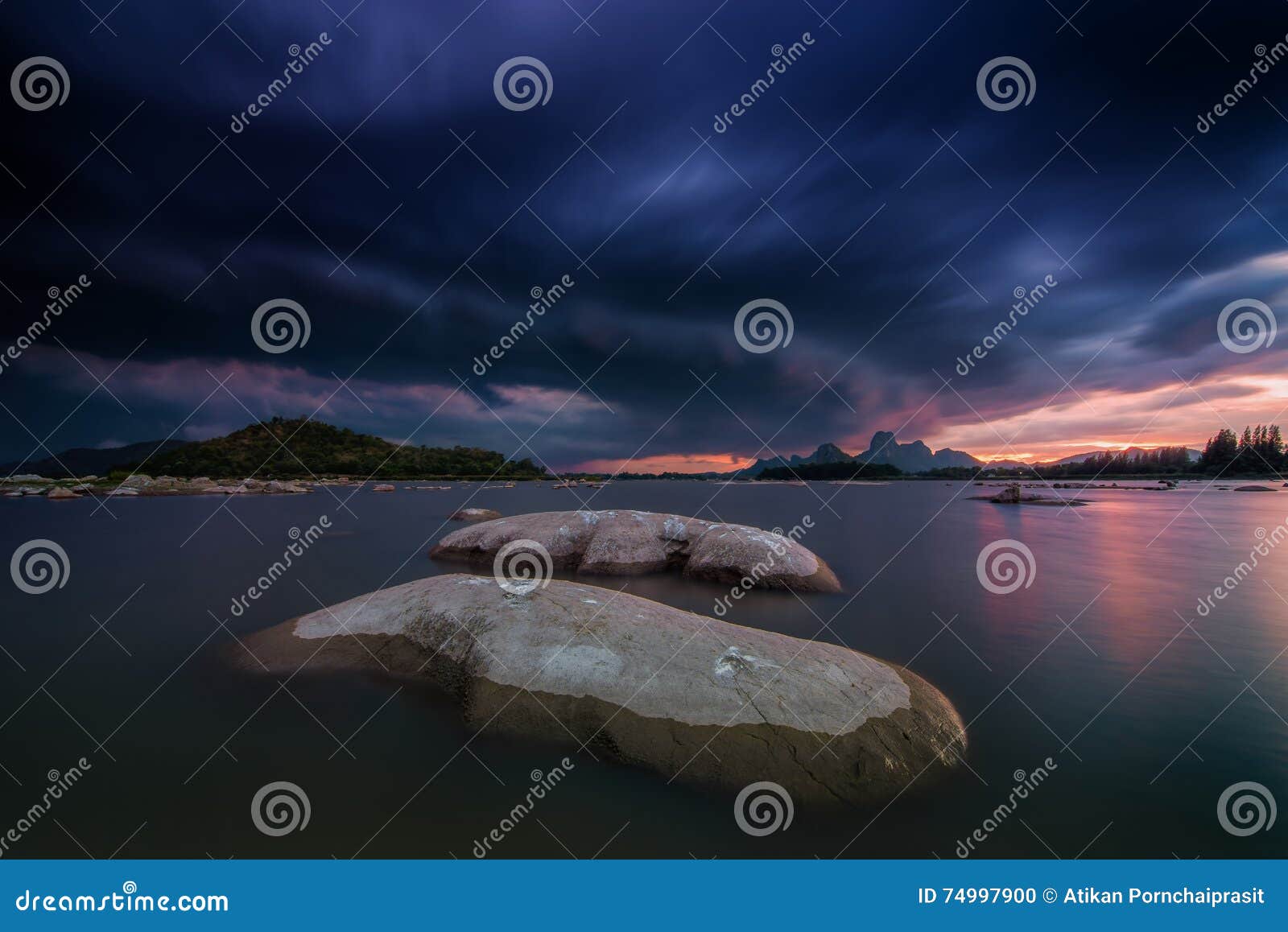 big rock in water