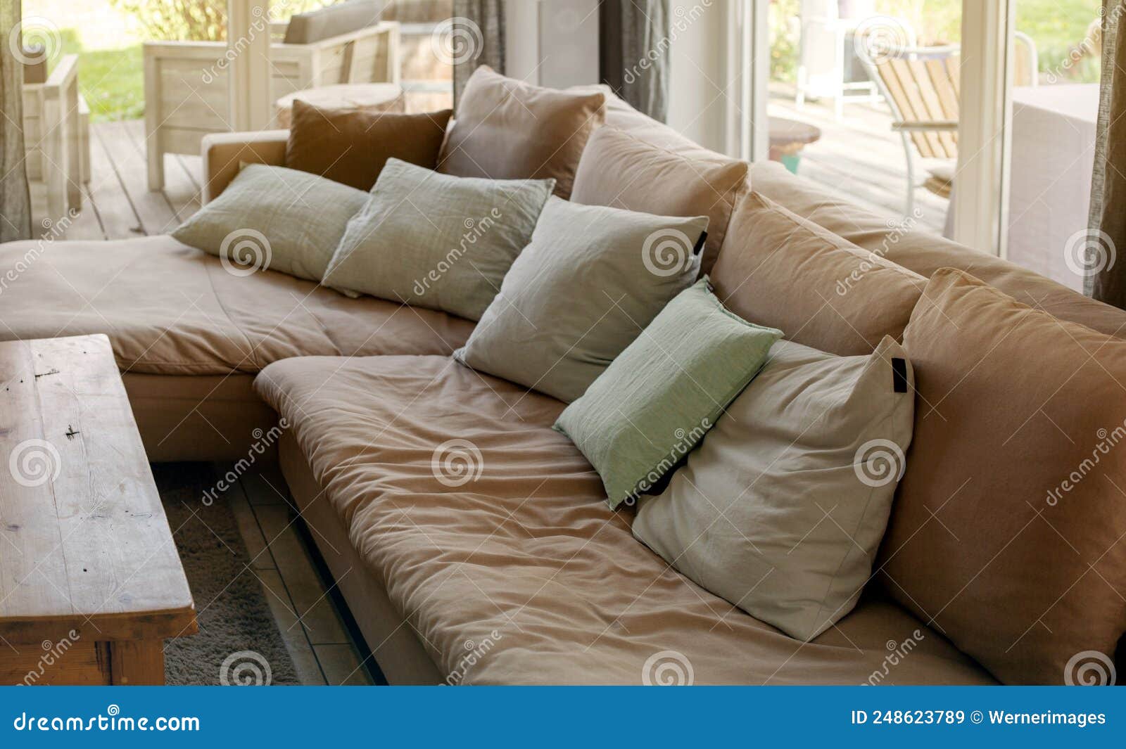 Big Sofa with Lots of Pillows in a Living Room Stock Image - Image