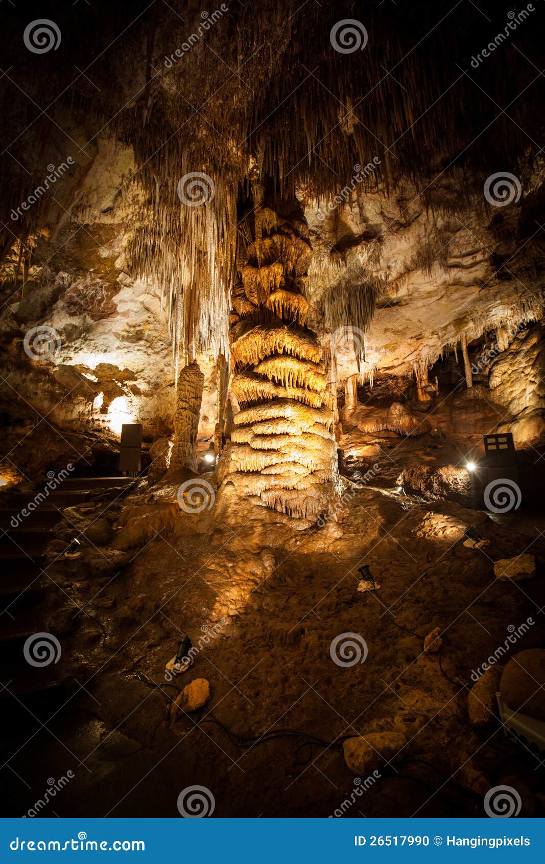 big stalagmite column formations in the cave