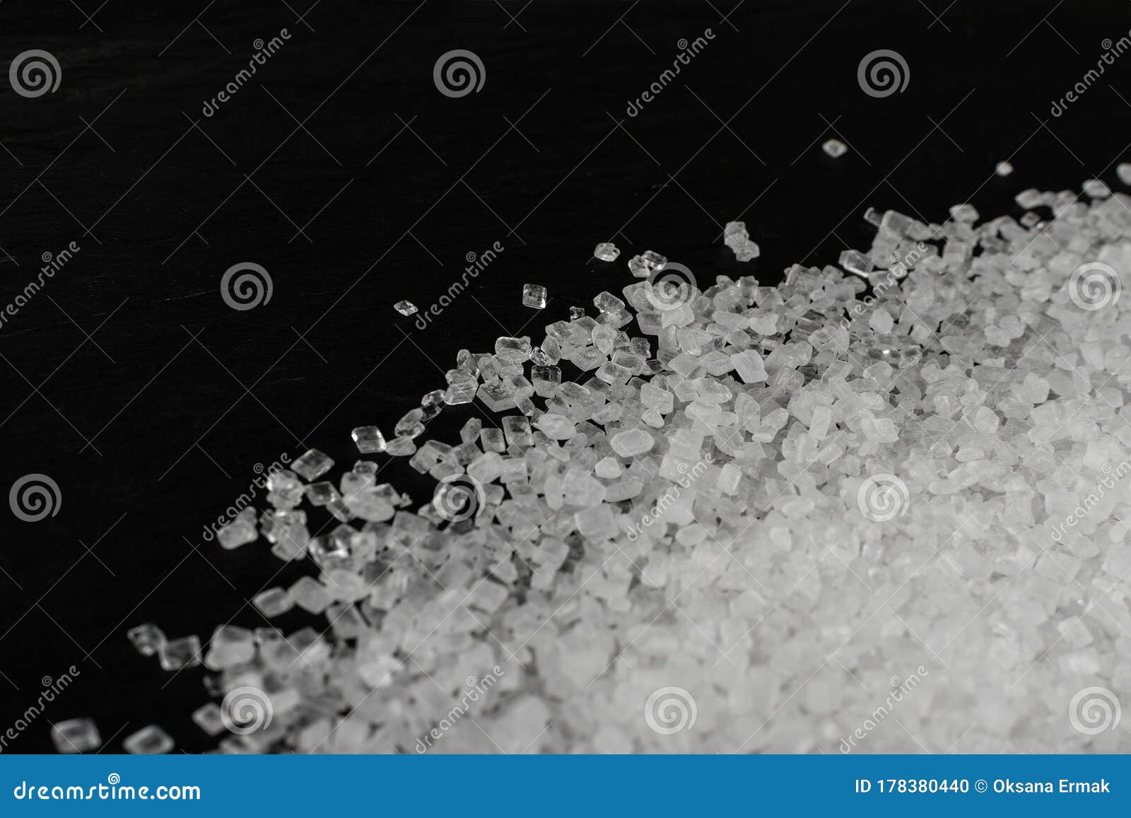 big sugar crystals or sucrose crystals on black background