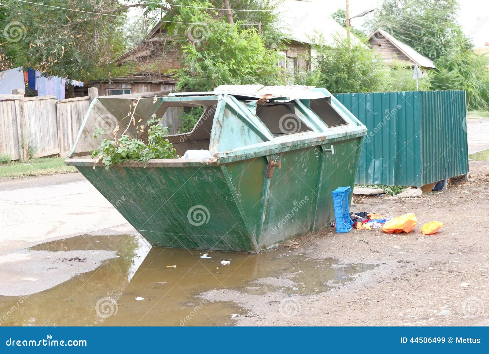 Big Trash Can in Ghetto in the Street Stock Image - Image of city, full:  44506499