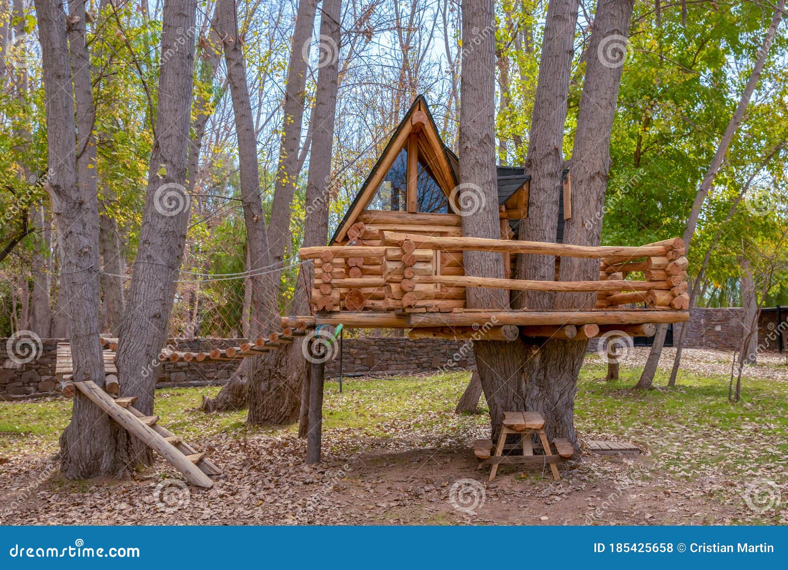 Big tree house in autumn stock photo. Image of cabin 185425658