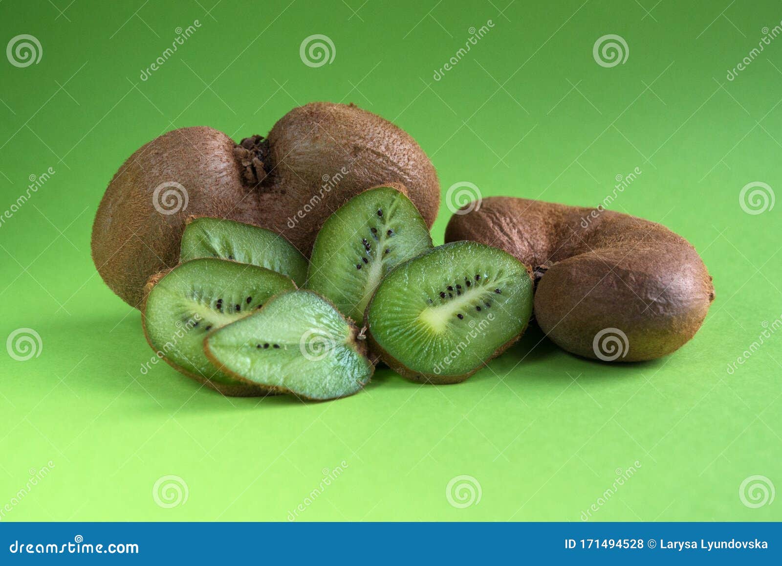 Big Ugly Vegetable Organic Kiwi on a Green Background. Sweet Fruit ...