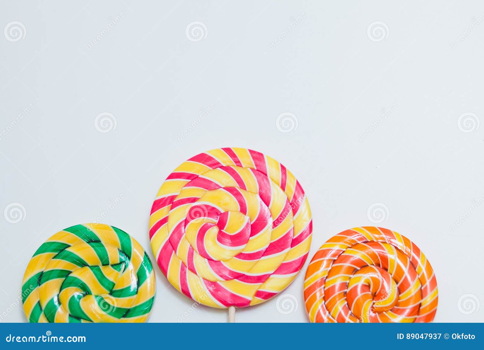 Big Yummy Lollipops on Sticks. Sweet Caramel Candy on White Stock Image ...