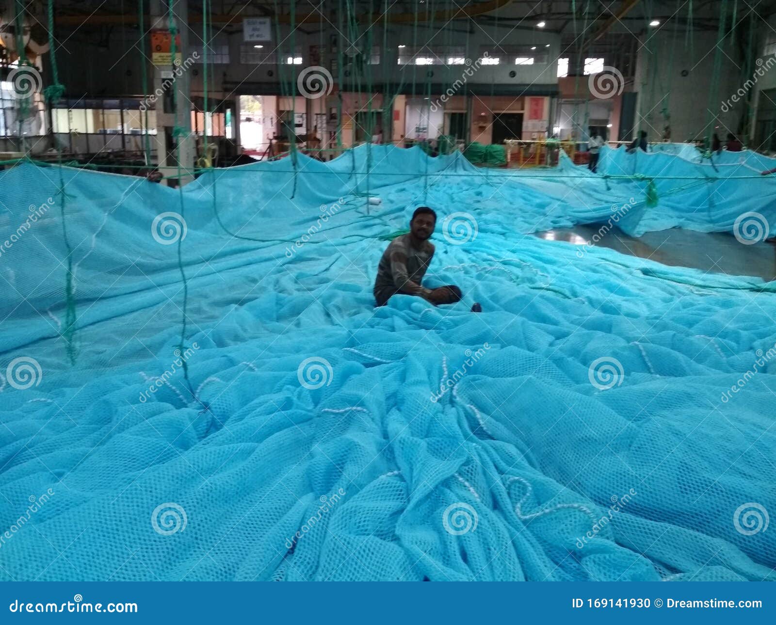 Biggest Rearing Fish Blue Colour Fish Net .this is Polymar Safety Net are  Made To Catch Fish . Editorial Image - Image of blue, colour: 169141930