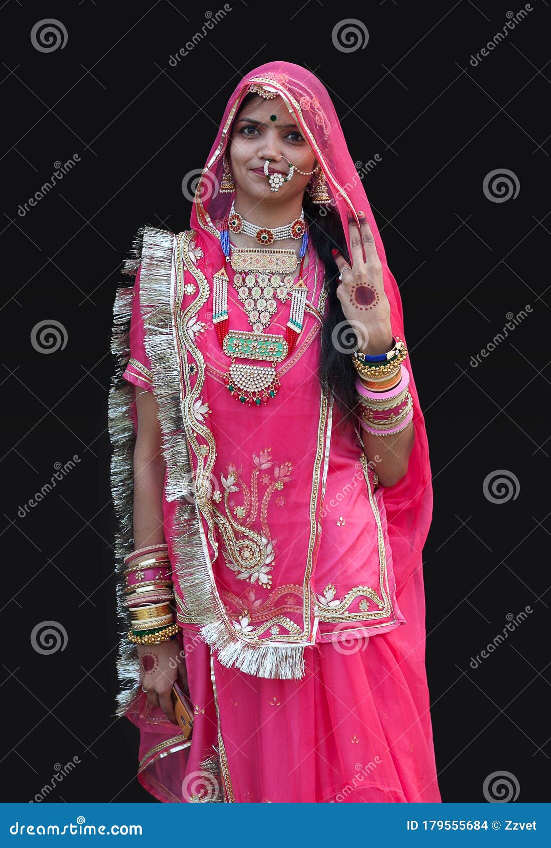 July 30, 2022, Srinagar, India: A girl dressed in a traditional Kashmiri dress  poses for a