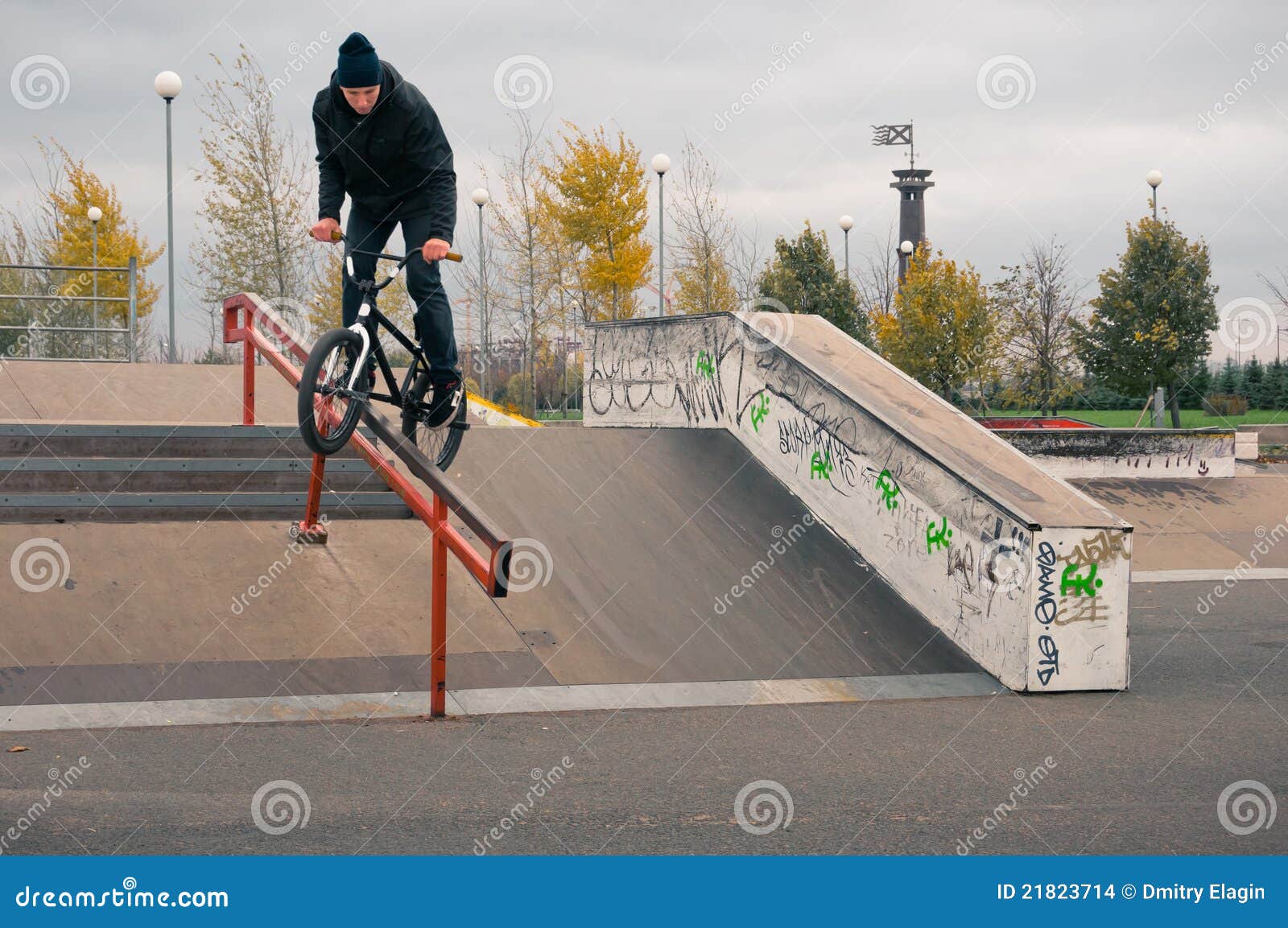 biker doing crank slide grind trick