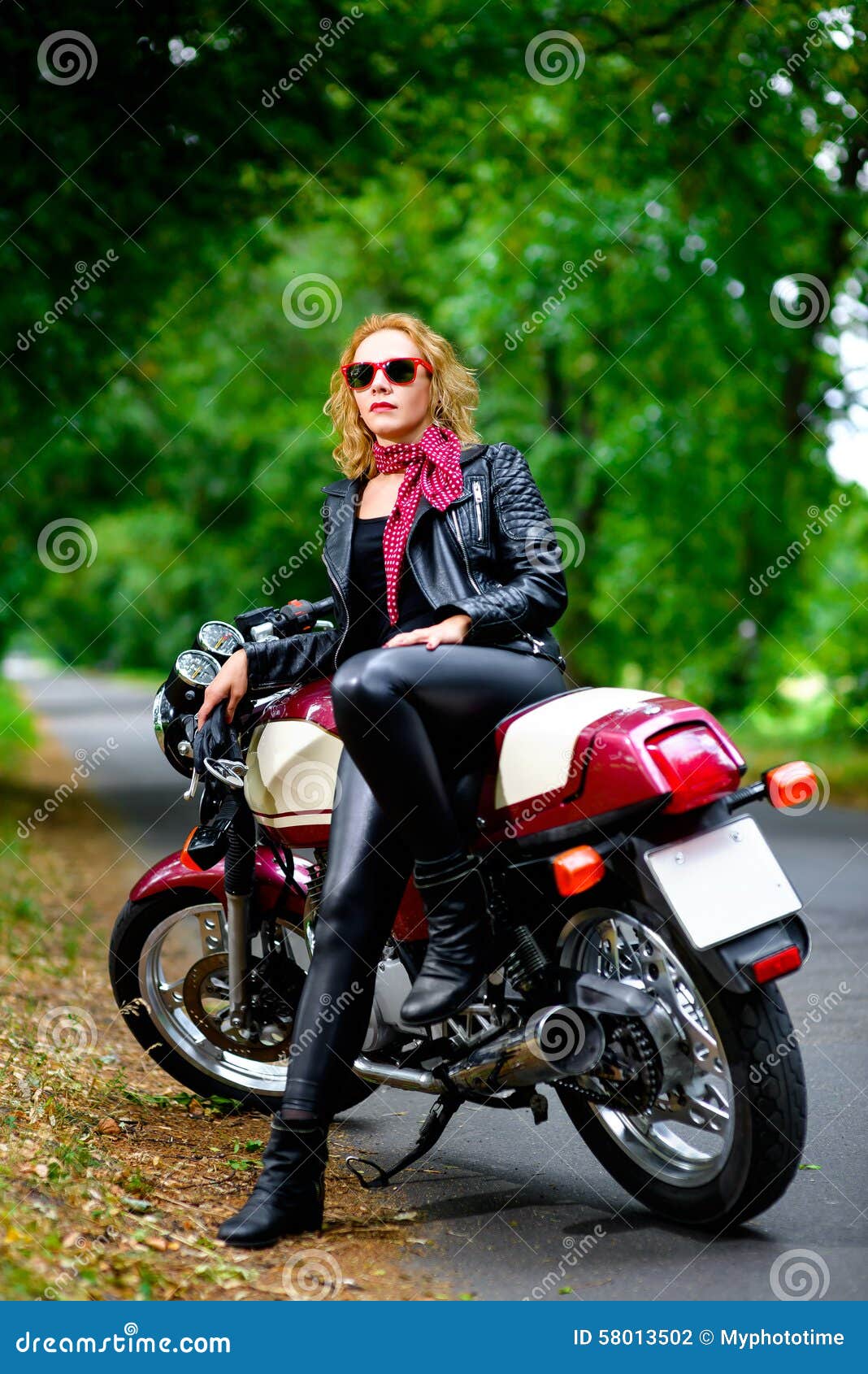 Biker Girl in Leather Jacket on a Motorcycle Stock Photo Image of