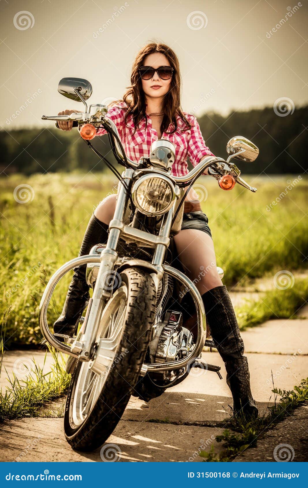 girl sitting on motorcycle