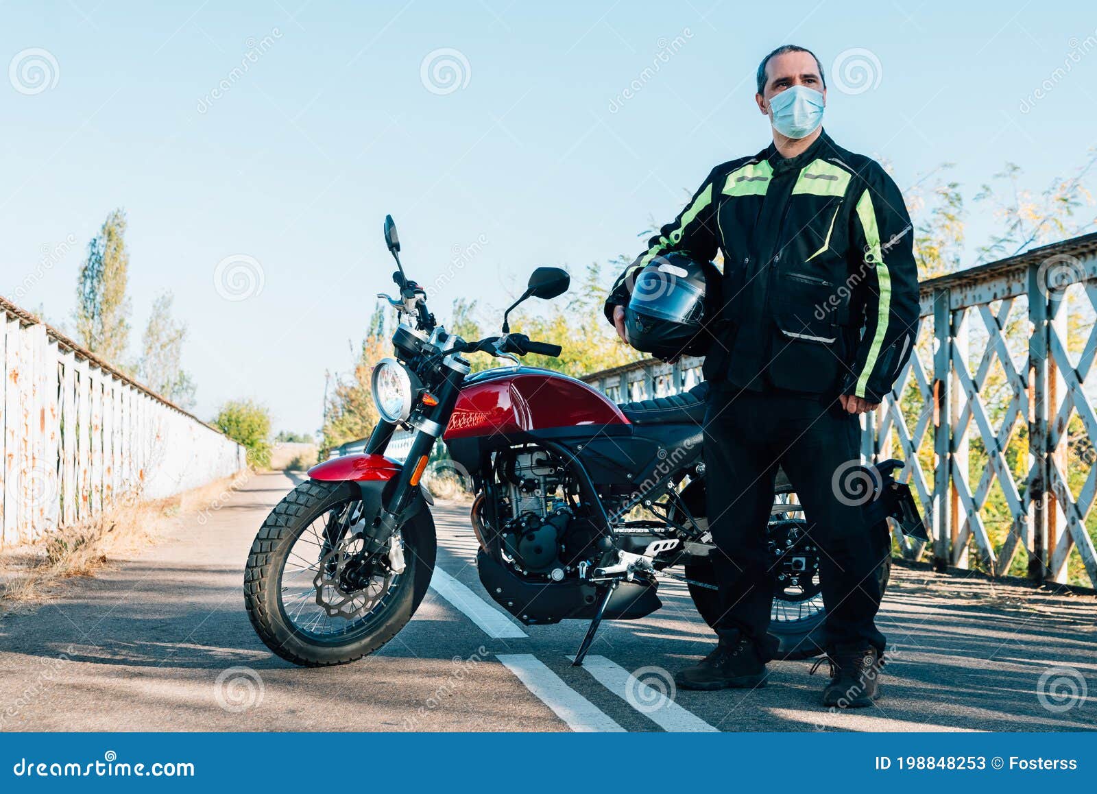 Biker with a Medical Mask and a Motorcycle Behind Stock Image Image of caucasian, health