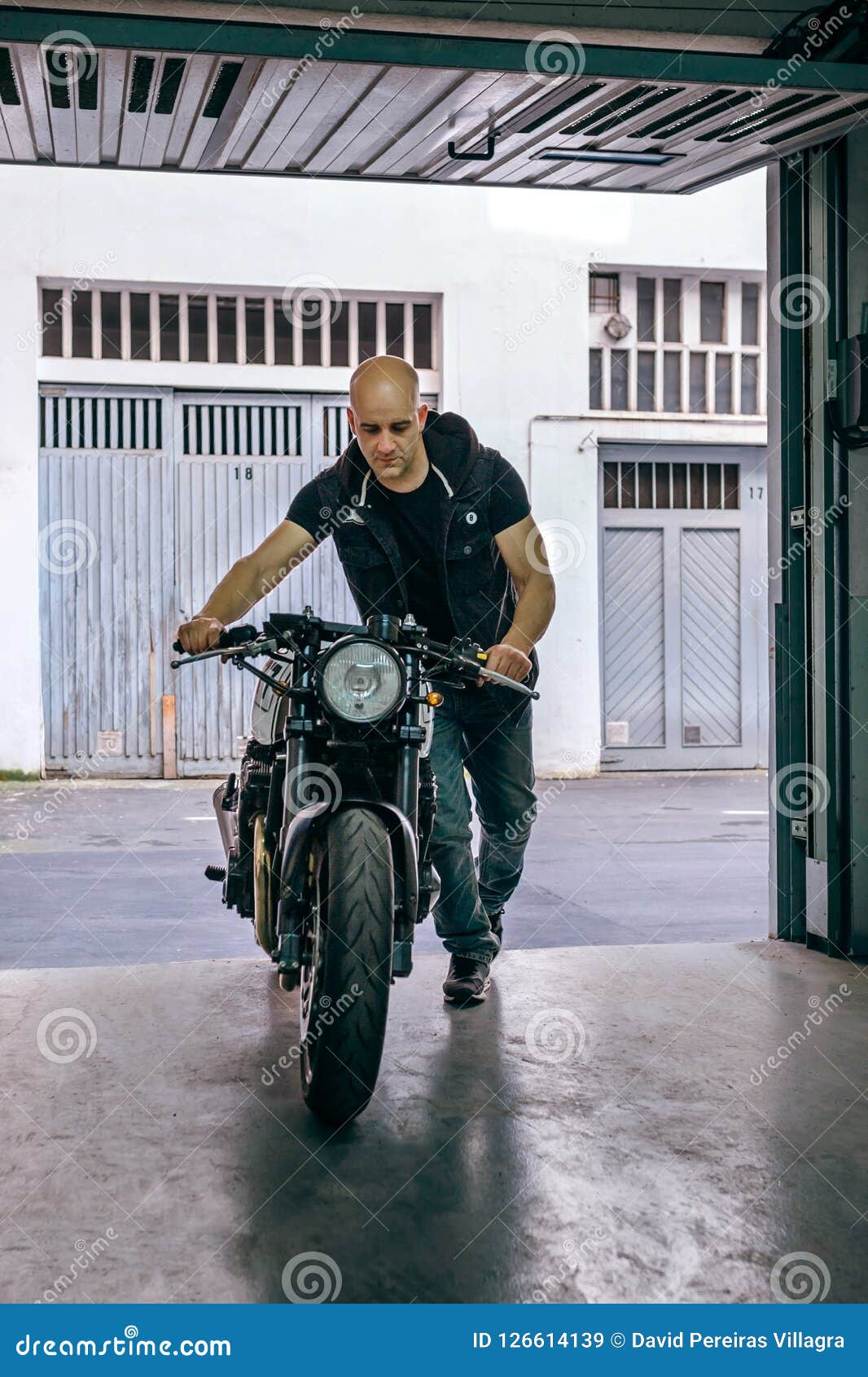 Biker Taking Motorbike To the Garage Stock Image Image of carry