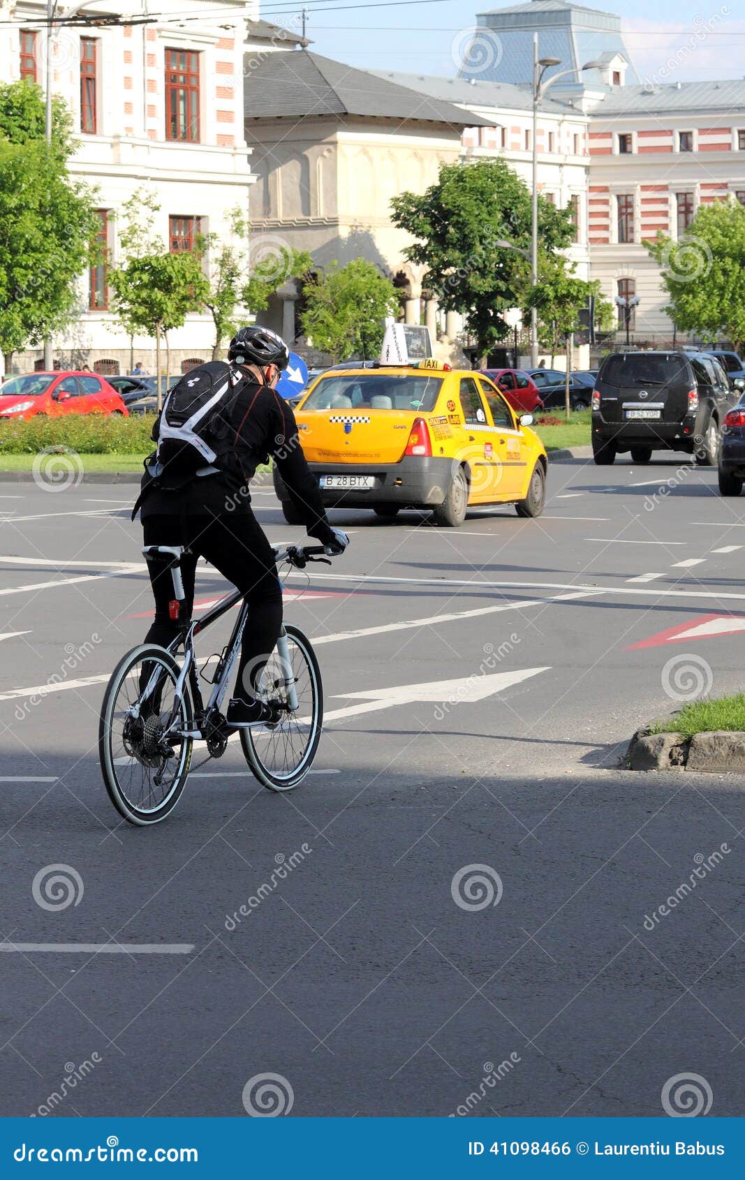 Biker in Traffic in Bucharest, Romania Editorial Photo Image of