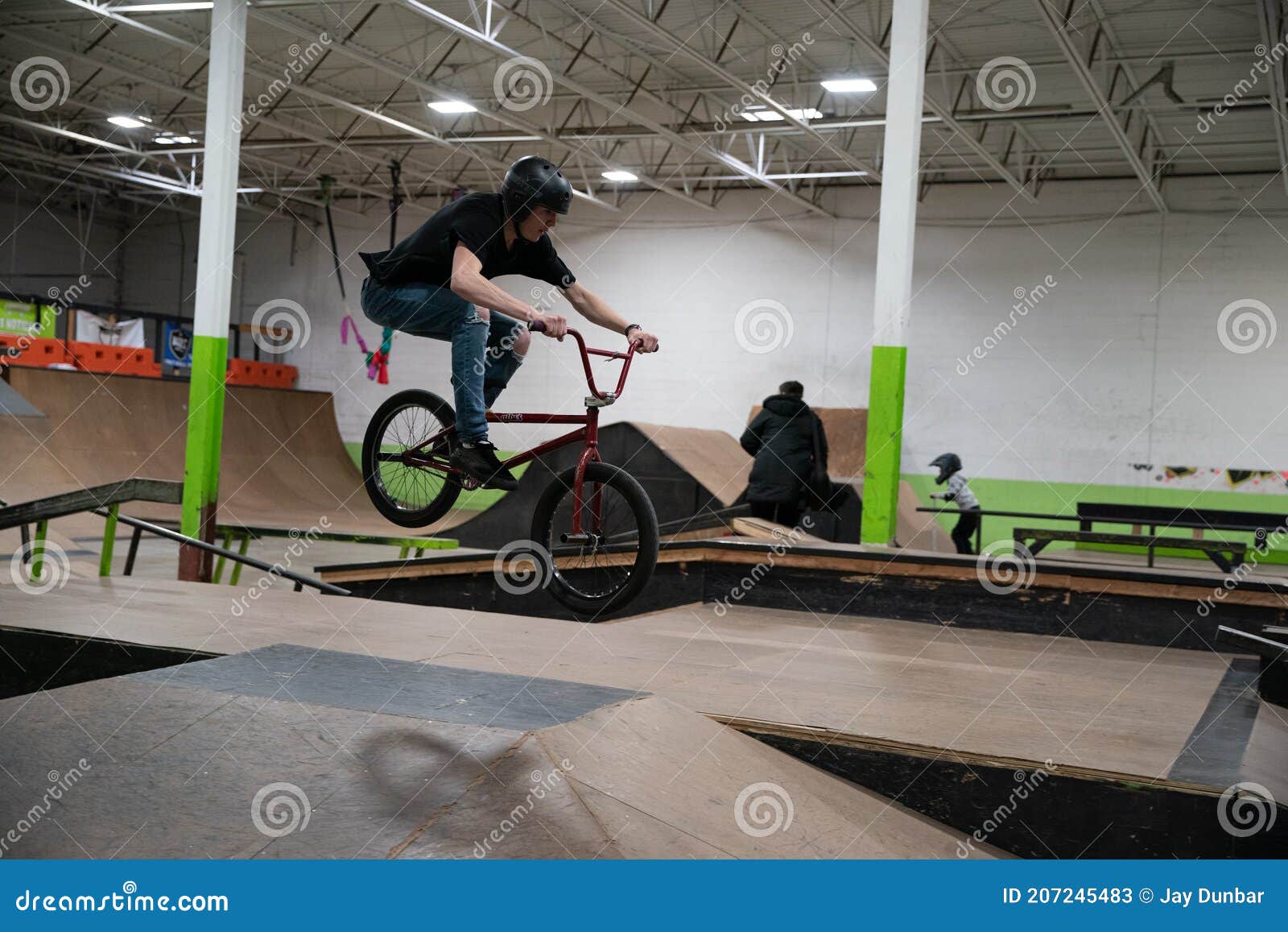 Bikers and Skaters are Practicing Their Tricks Inside Editorial Stock