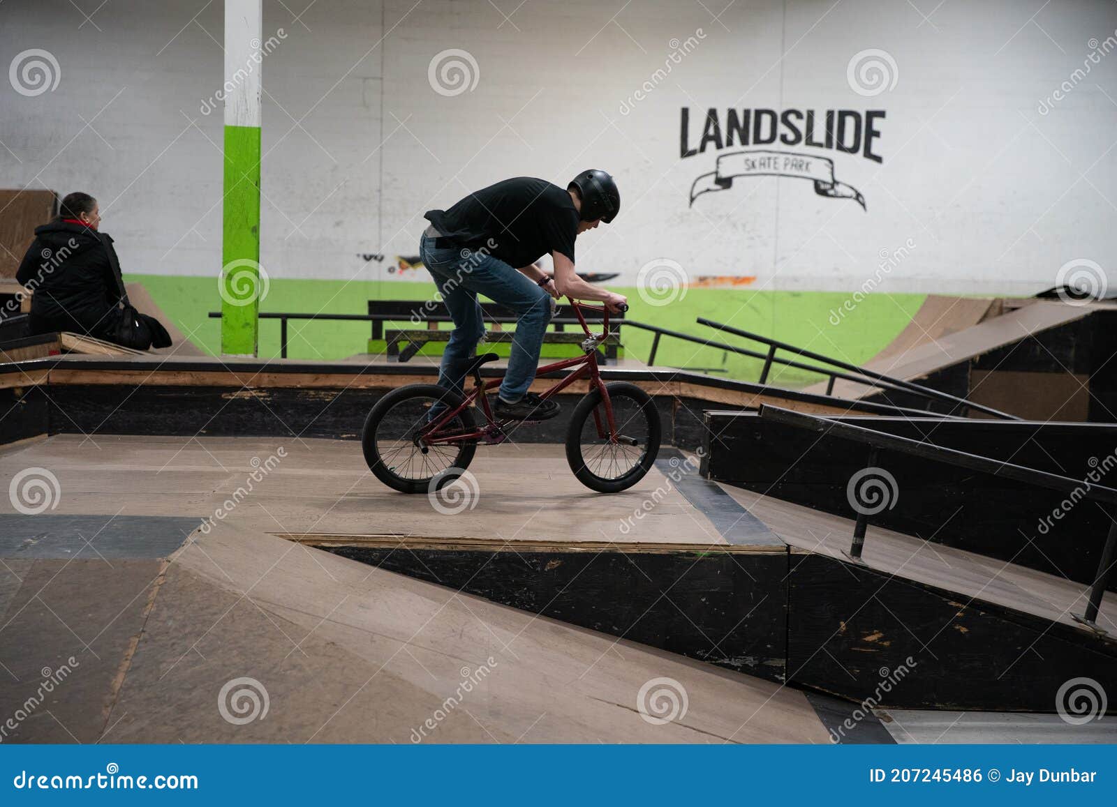 Bikers and Skaters are Practicing Their Tricks Inside Editorial Photo