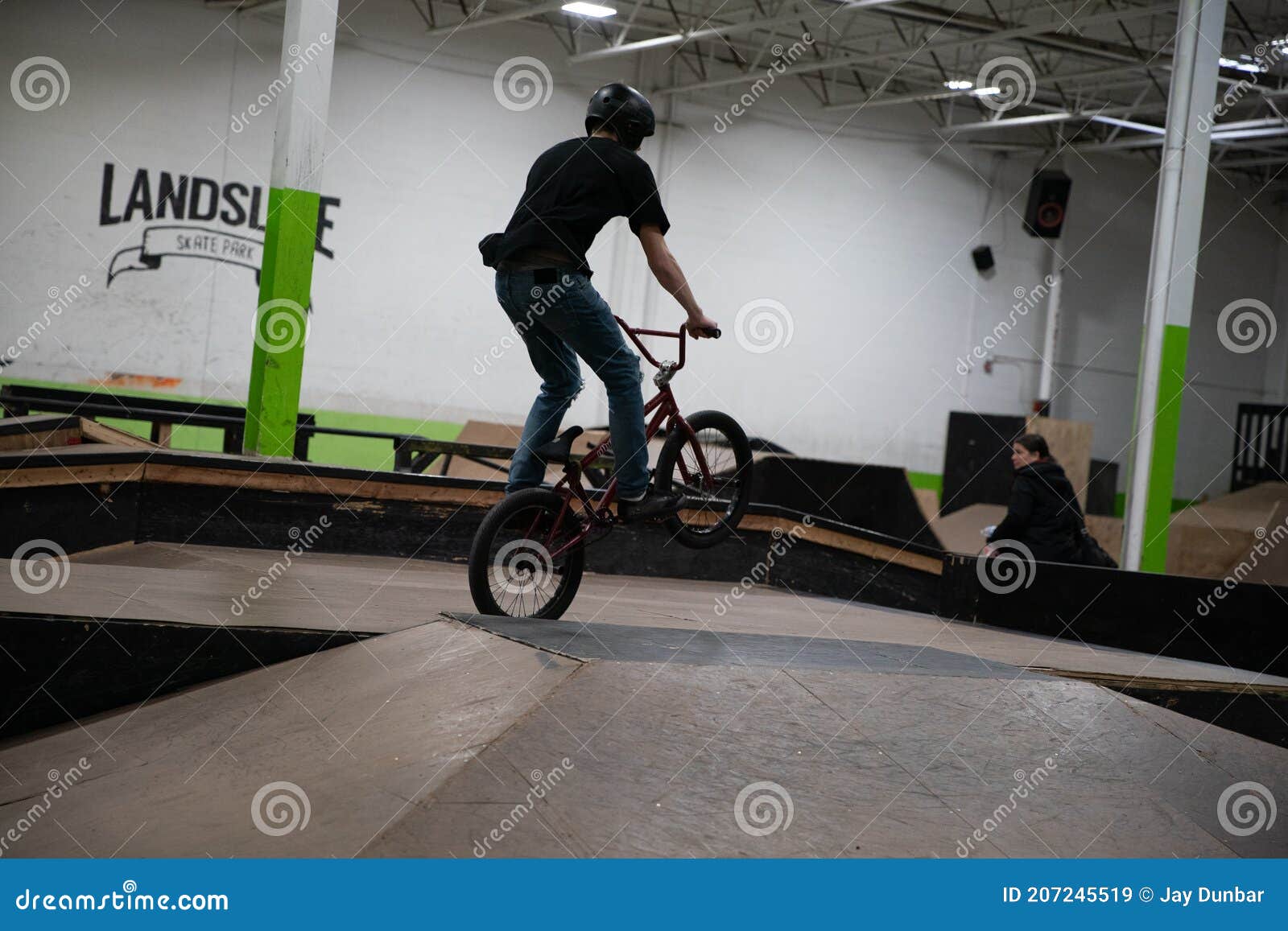 Bikers and Skaters are Practicing Their Tricks Inside Editorial Stock