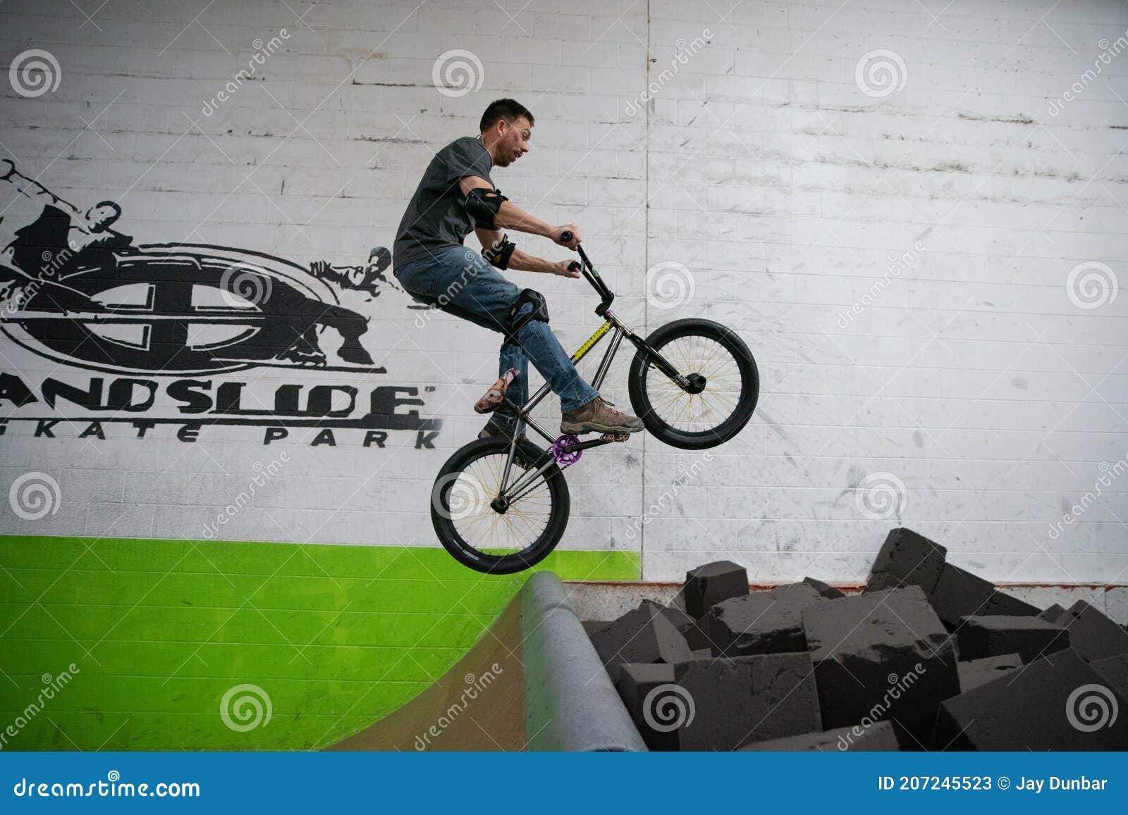 Bikers and Skaters are Practicing Their Tricks Inside Editorial Stock