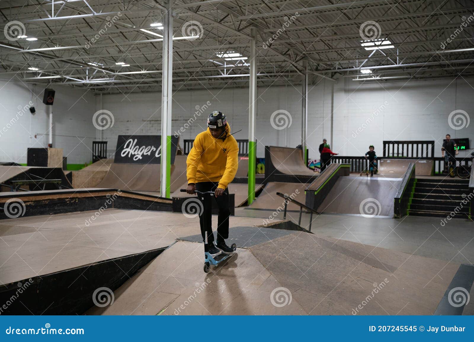 Bikers and Skaters are Practicing Their Tricks Inside Editorial Image