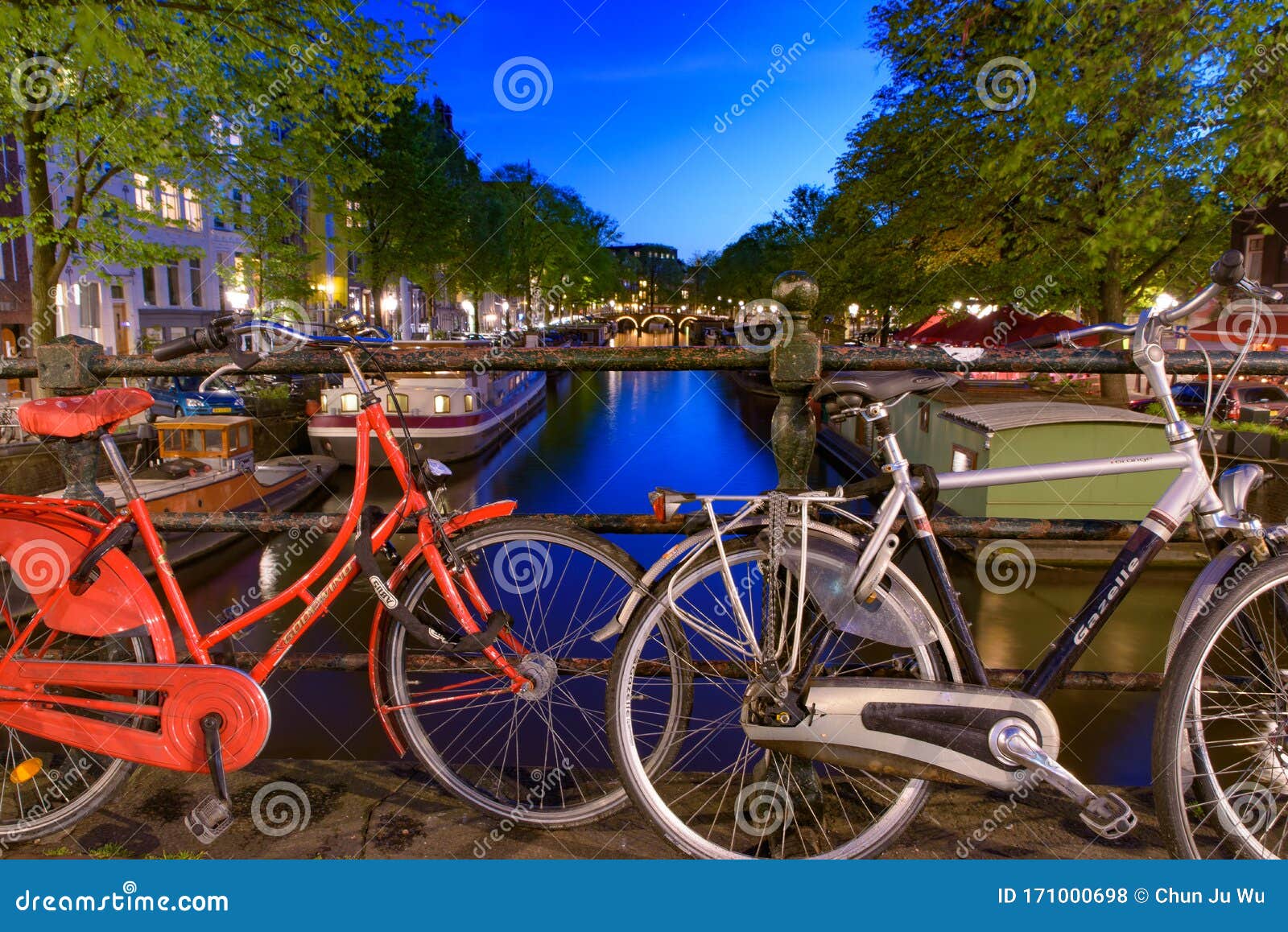 Bikes on the Bridge that Crosses the Canal in Amsterdam Editorial Stock ...