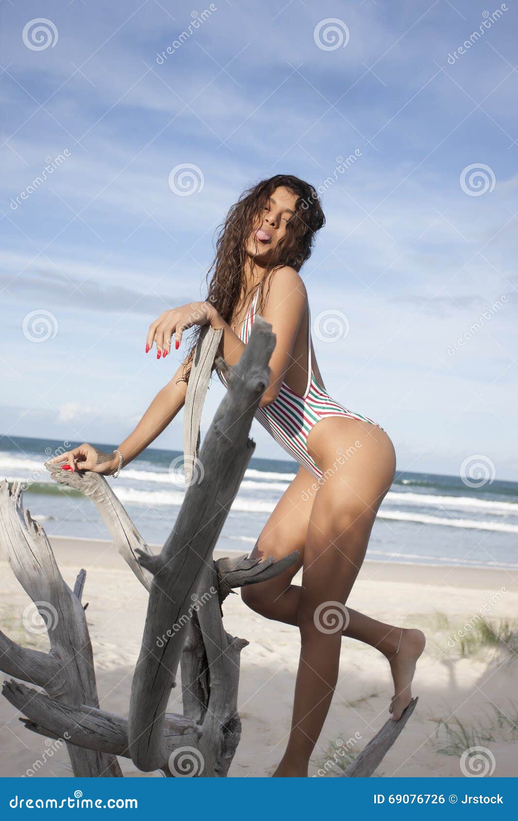 Bikini Lady Standing On Broken Tree And Smiling Stock Photo ...