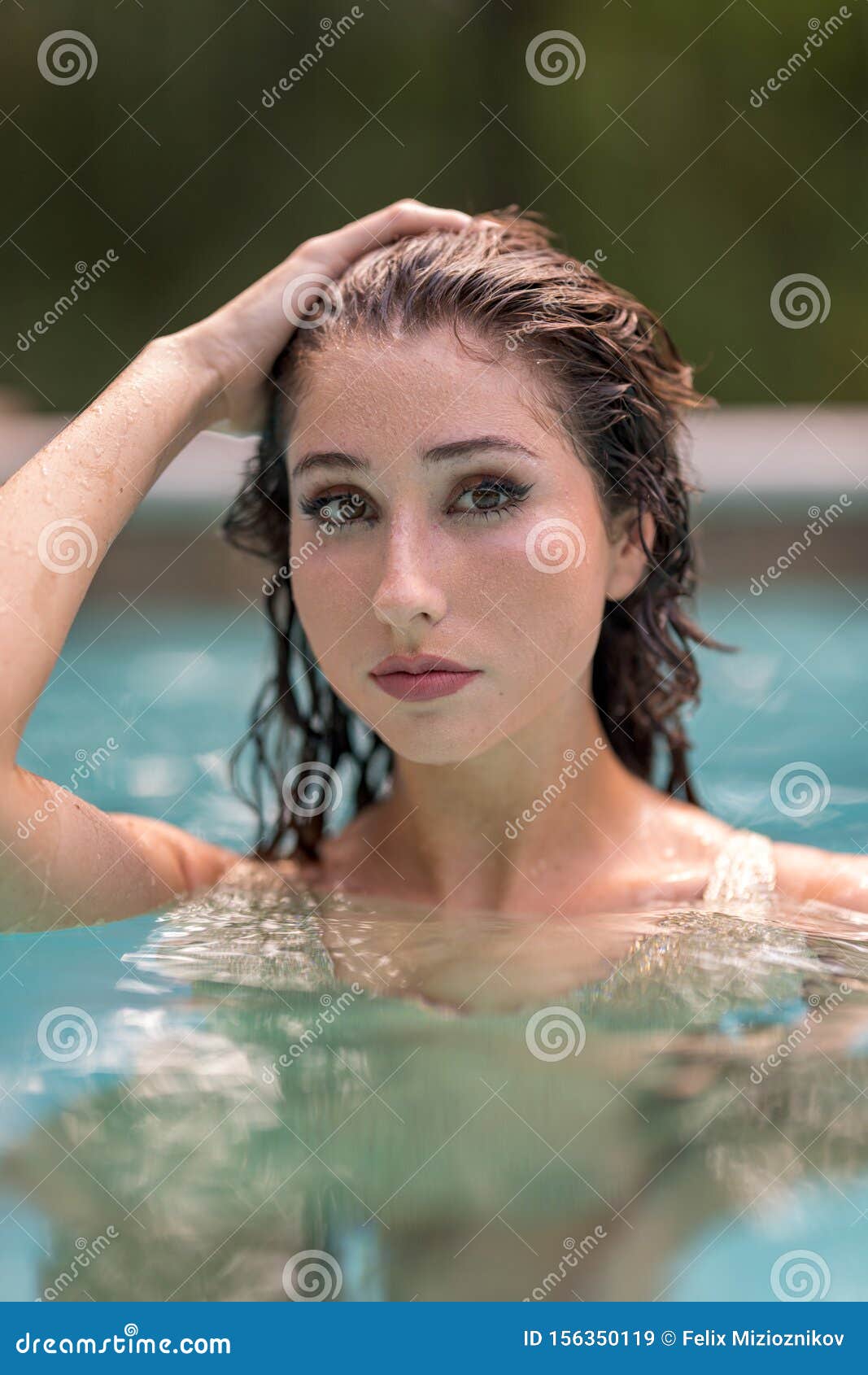 Bikini Model Posing In A Pool With Hand On Head Stock Image Image Of Portrait Fashion 156350119 