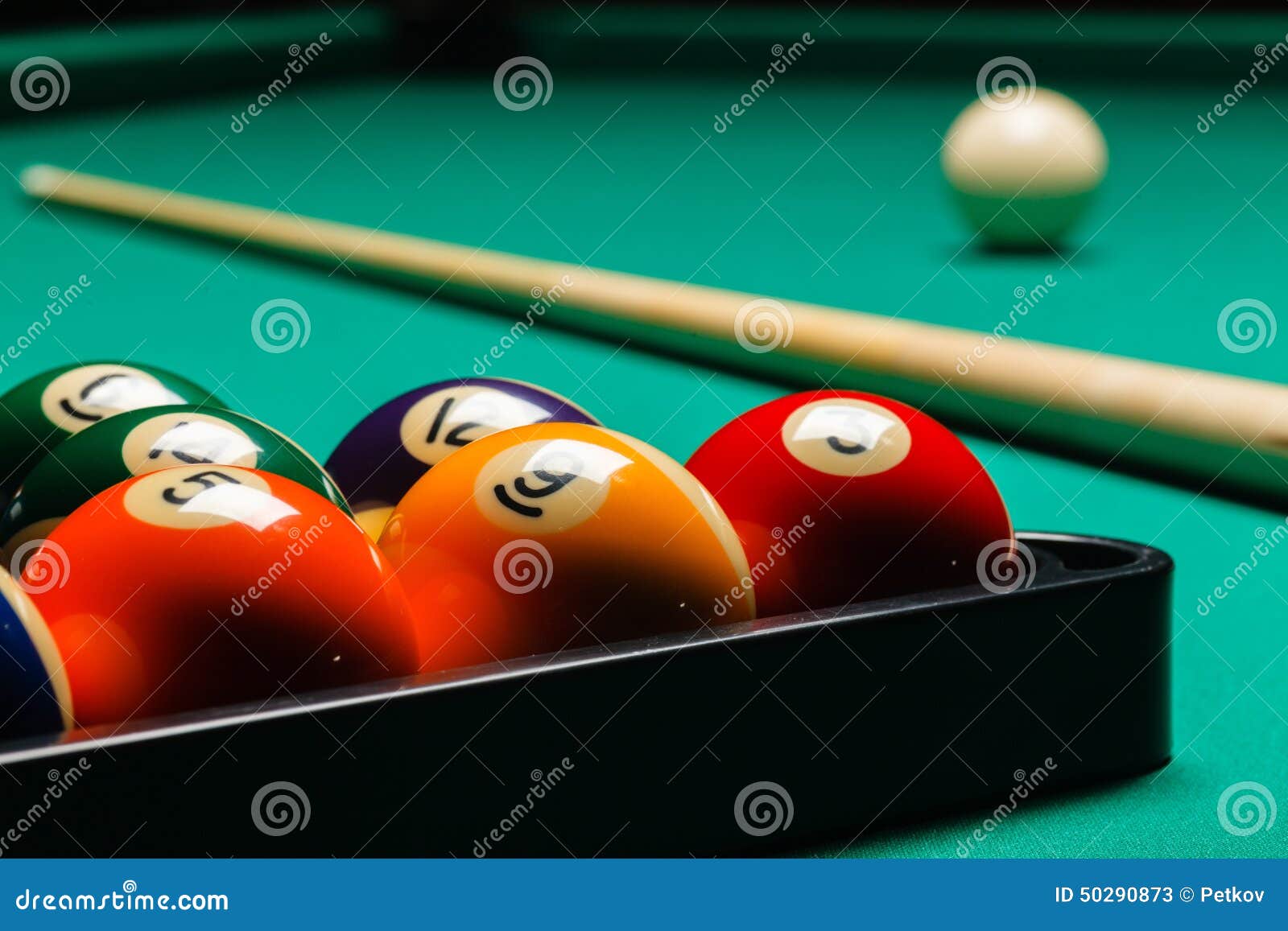 billiard balls in a pool table