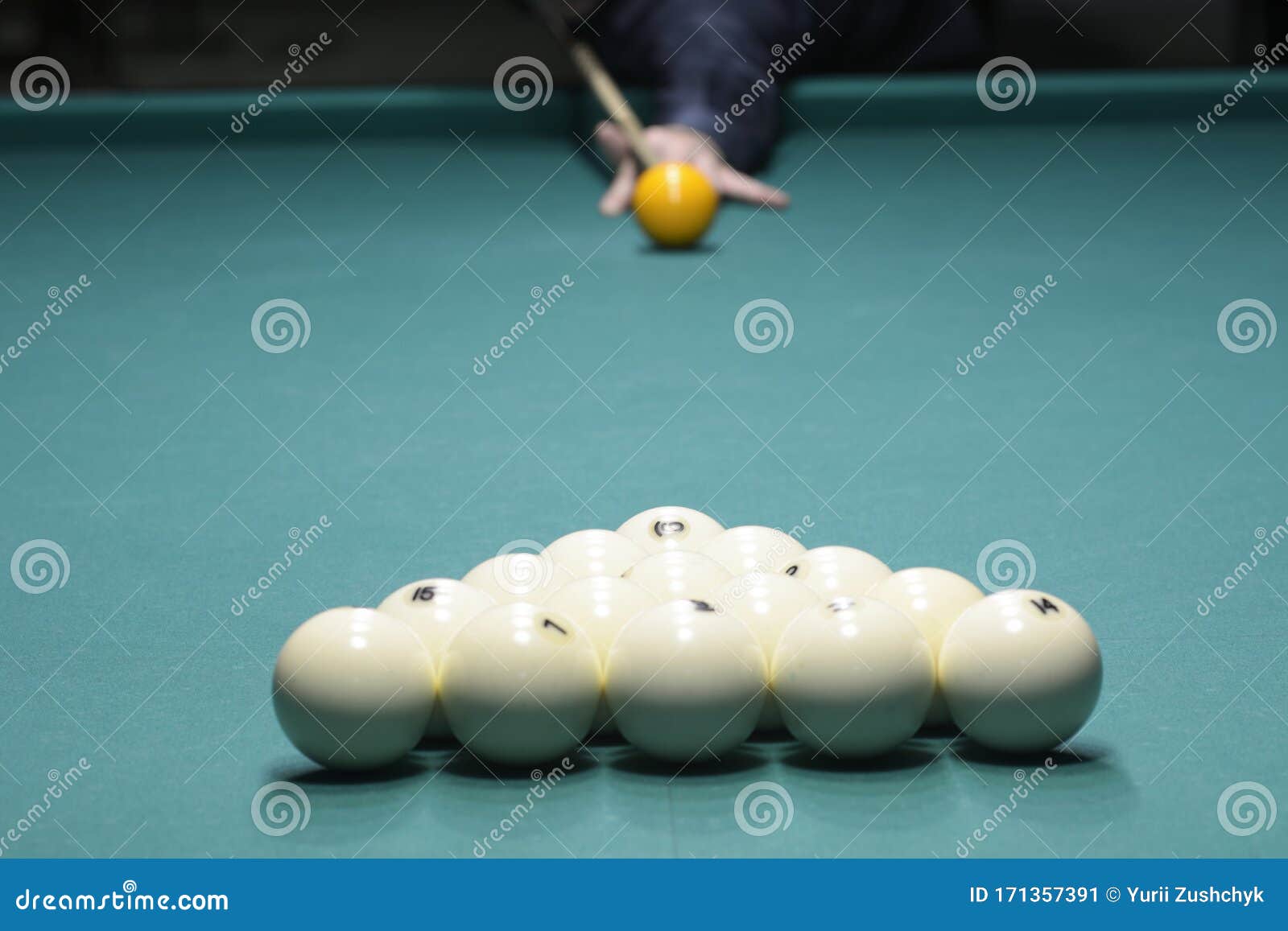 Billiard Player Arm Breaking the Pyramid by Striking the Ball with Cue