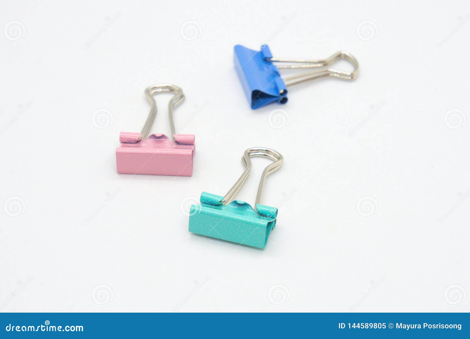 The Binder Clips Color is Turquoise Blue and Pink. Stock Image Image