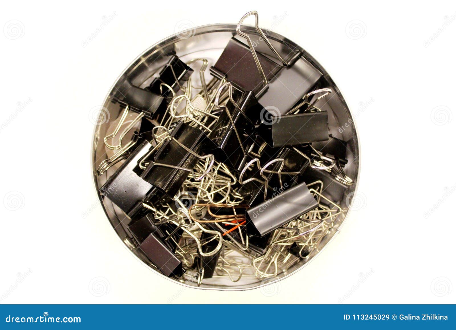 binder clips in a round box