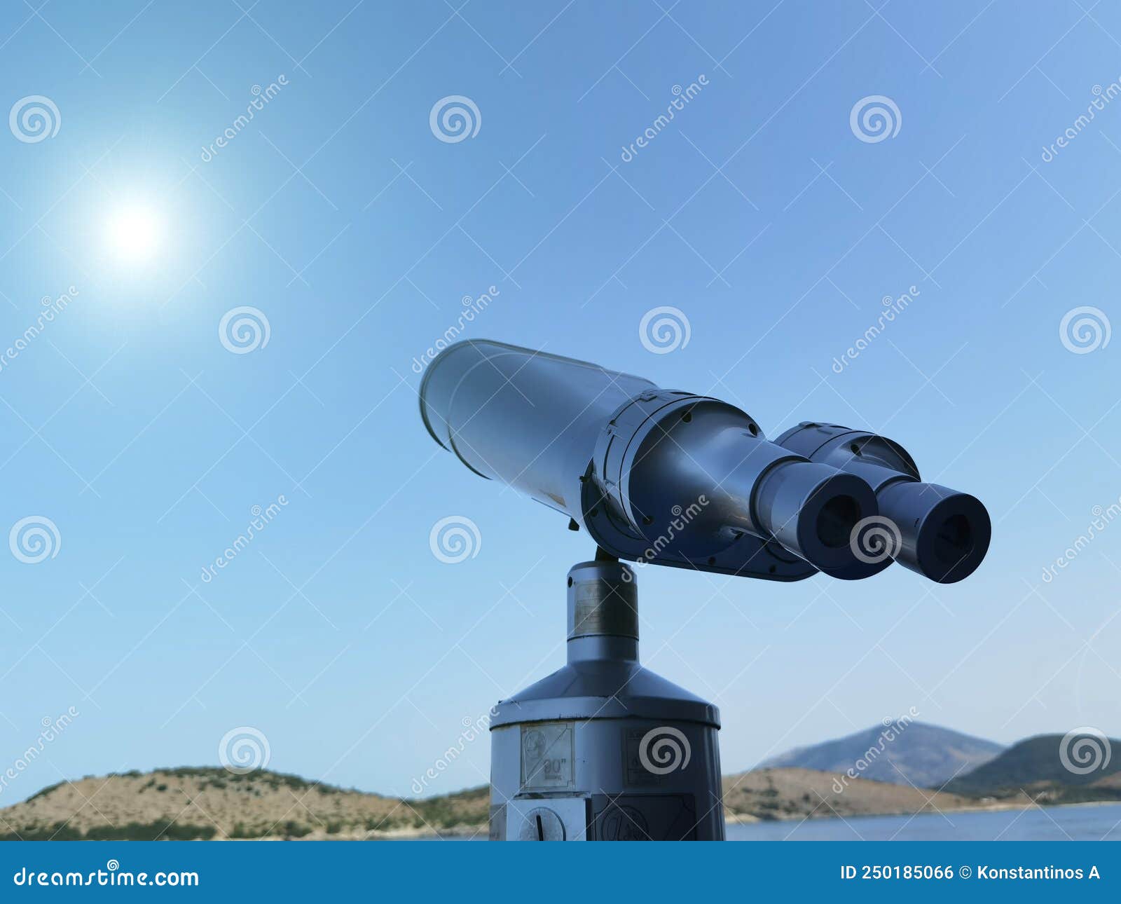 Binocular Isolated on the Blue Sky Watching on the Sea Stock Photo