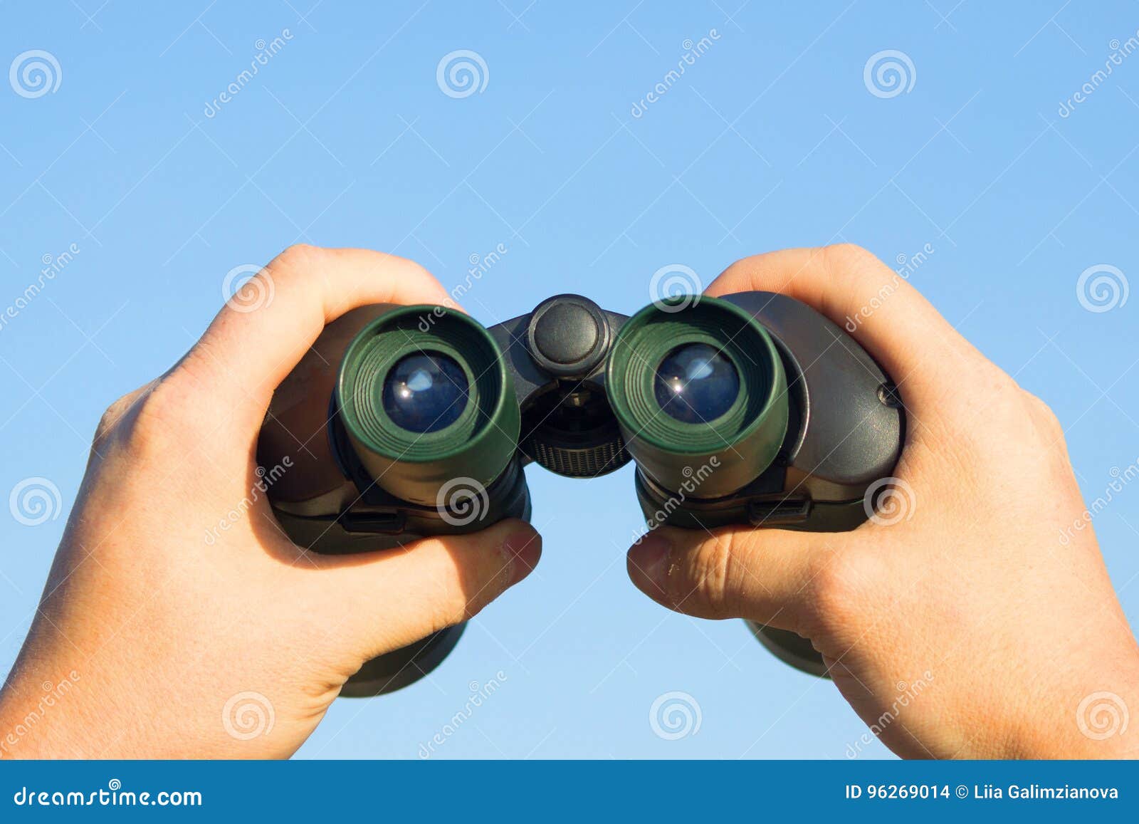 Binocular in mans hands stock photo. Image of people 96269014