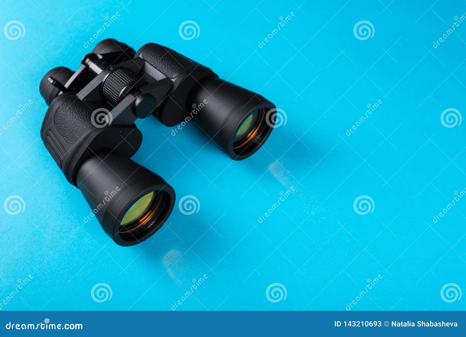 Binoculars with Orange Lens on Blue Background Stock Image Image of