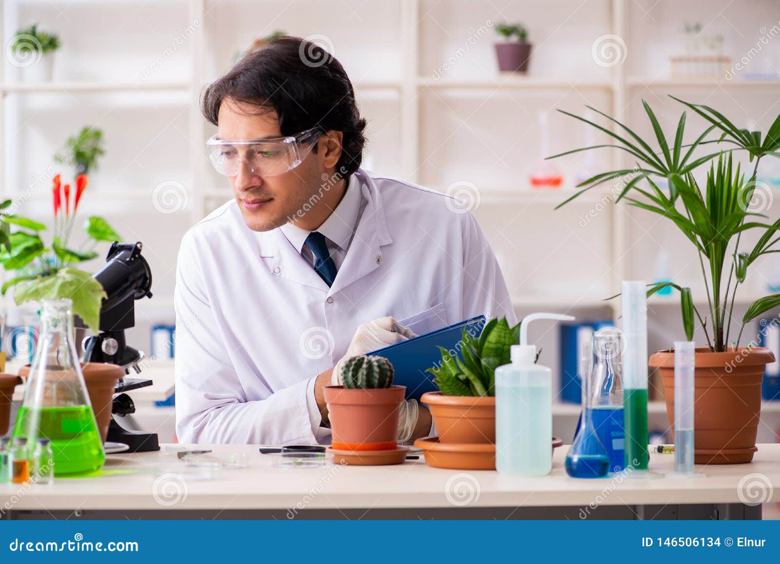 The Biotechnology Chemist Working in Lab Stock Photo Image of