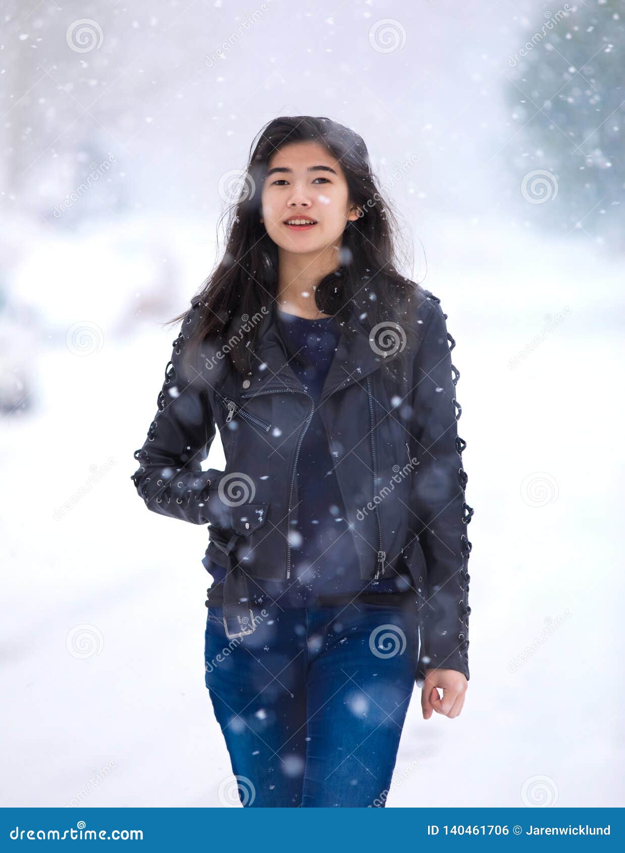 Teen Girl Walking Along Street in Snowstorm Stock Photo - Image of ...
