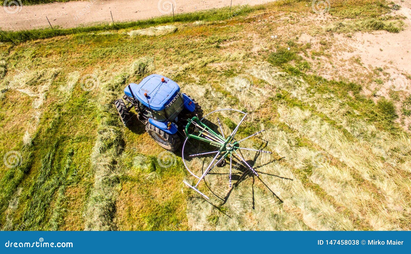 Bird Eye of Hay Rake Tractor Turning the Hay Stock Photo Image of