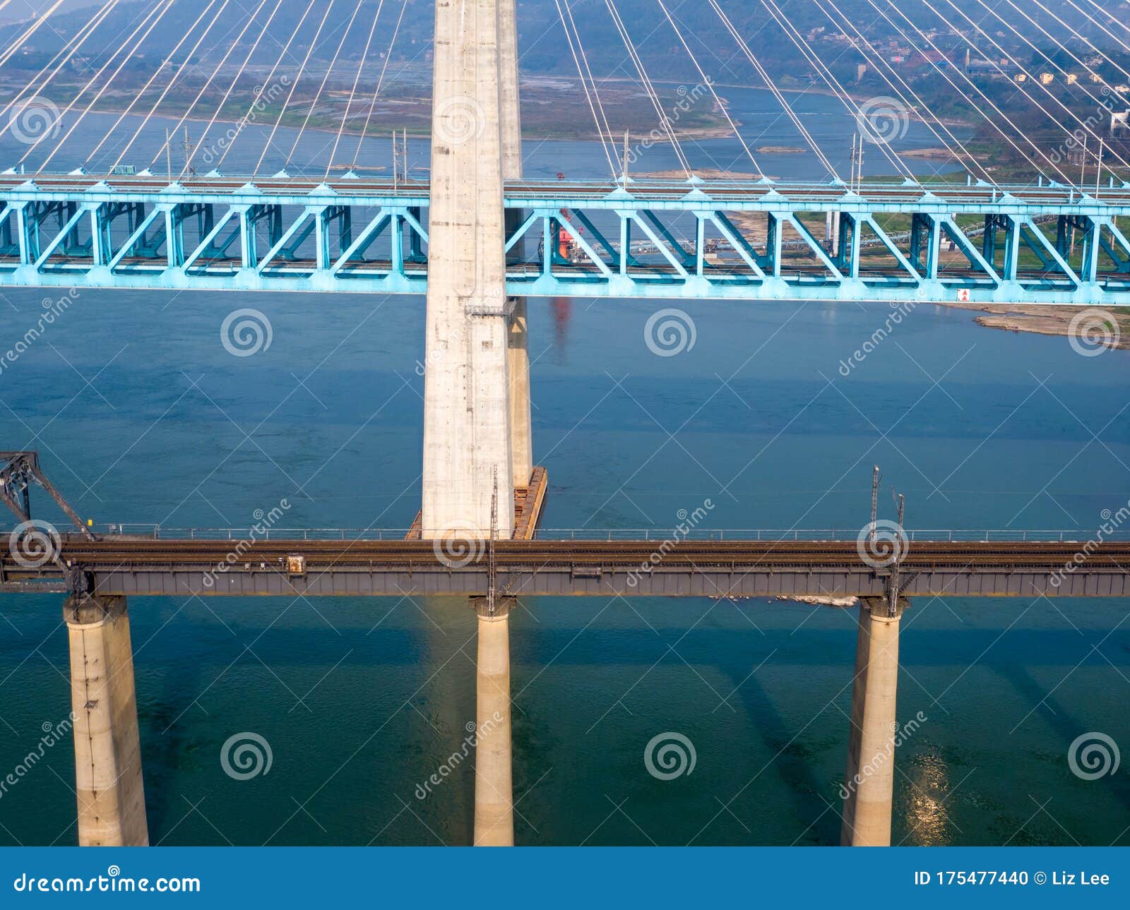 bird view of old and new baishatuo yangtze river railway bridge under blue sky