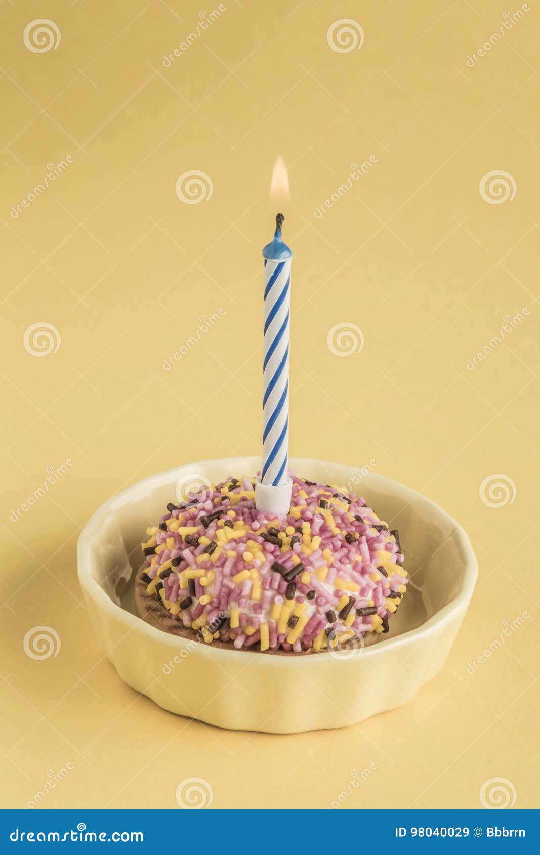 Birthday Cake with One Candle on Yellow Stock Image Image of candle