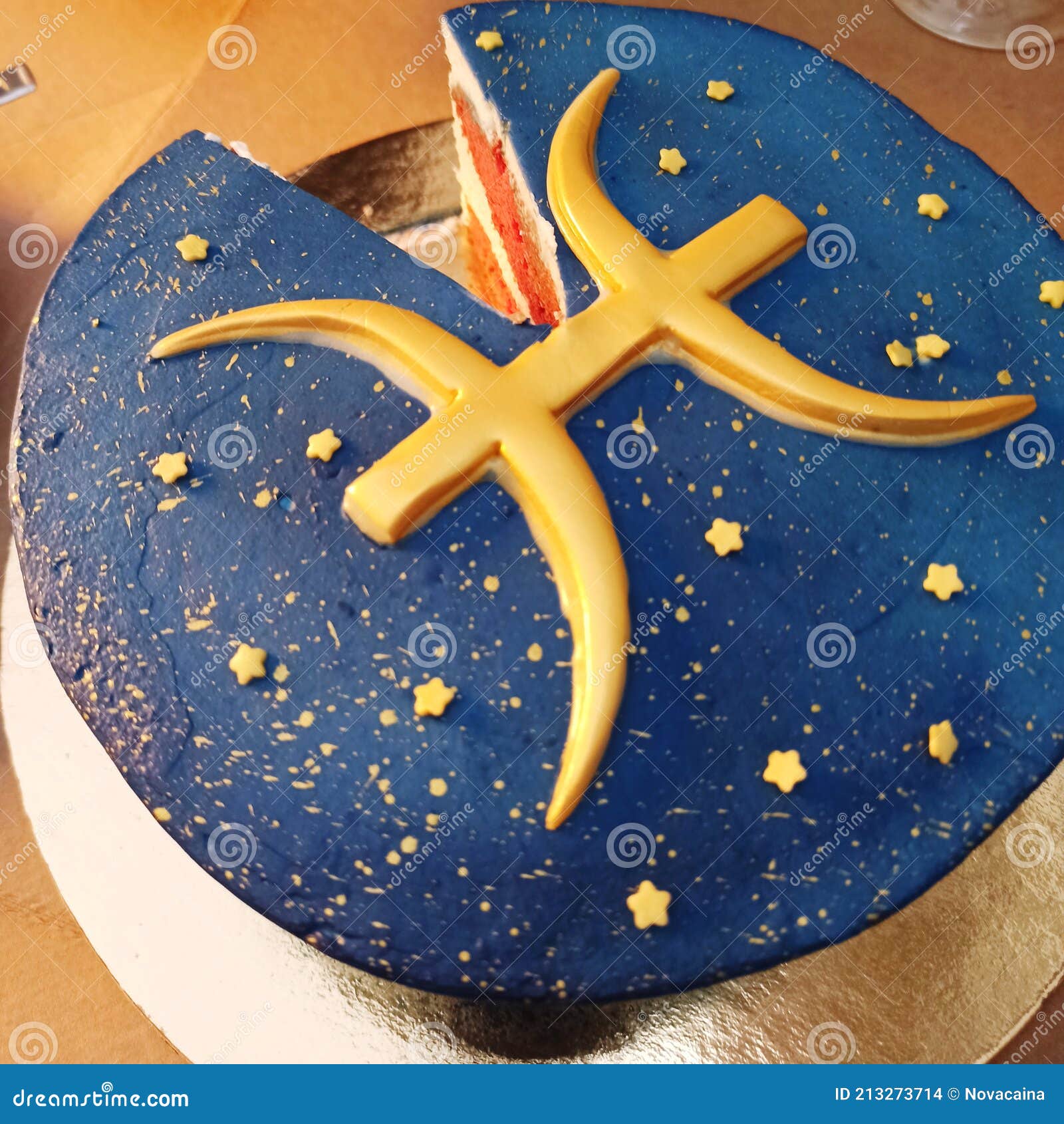 Cut Birthday Cake with Zodiac Sign of Fish Stock Photo Image of