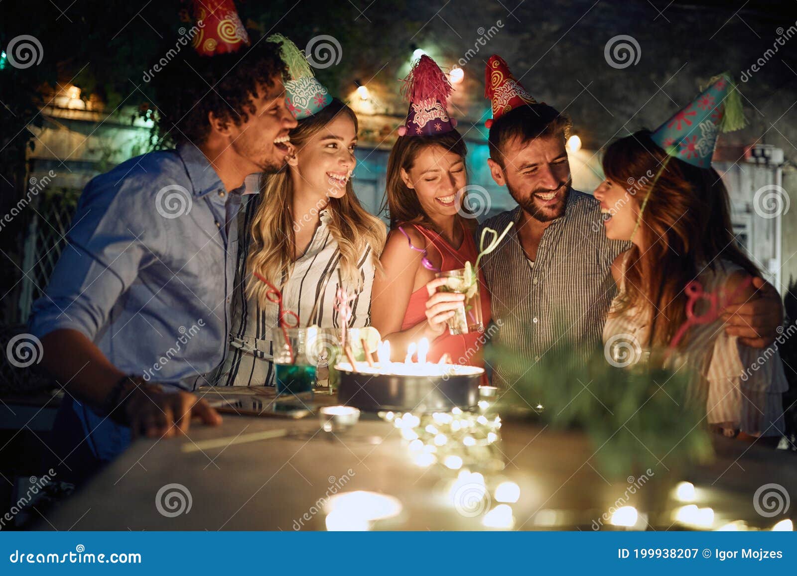 The Birthday Celebrant Enjoying with Friends at Open Air Party. Quality Time Together Stock Image - Image of adult, 199938207
