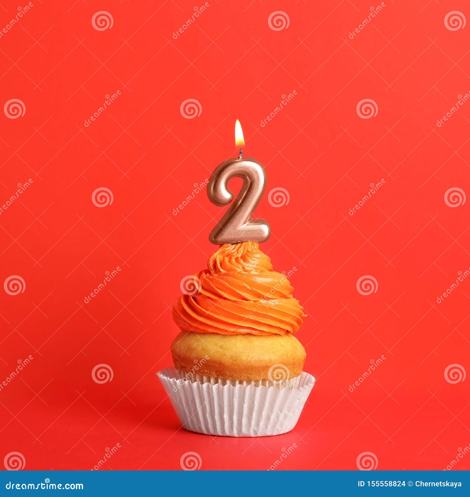 Birthday Cupcake with Number Two Candle on Red Stock Photo - Image of ...